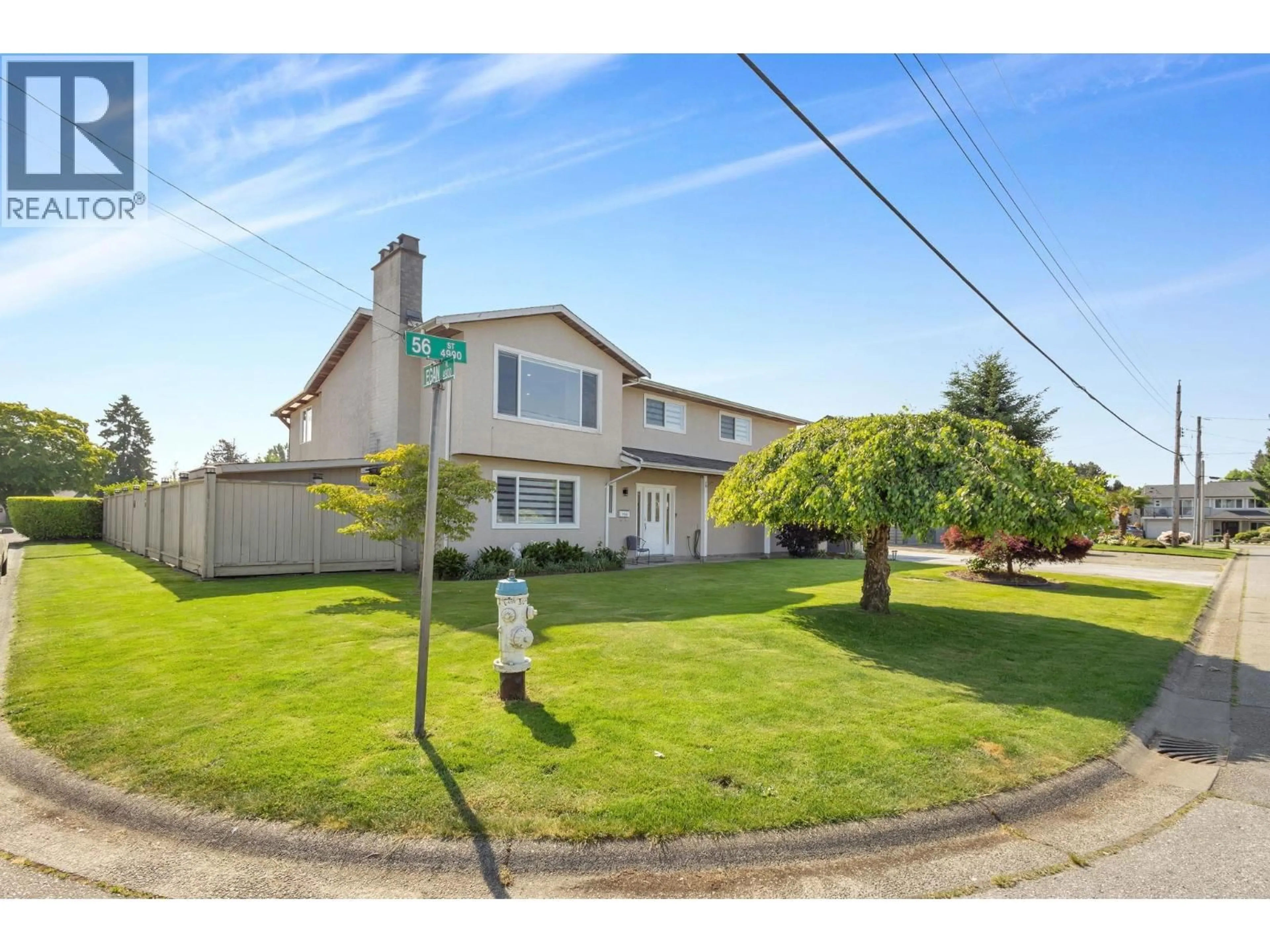 A pic from outside/outdoor area/front of a property/back of a property/a pic from drone, street for 4908 56 STREET, Delta British Columbia V4K3C4