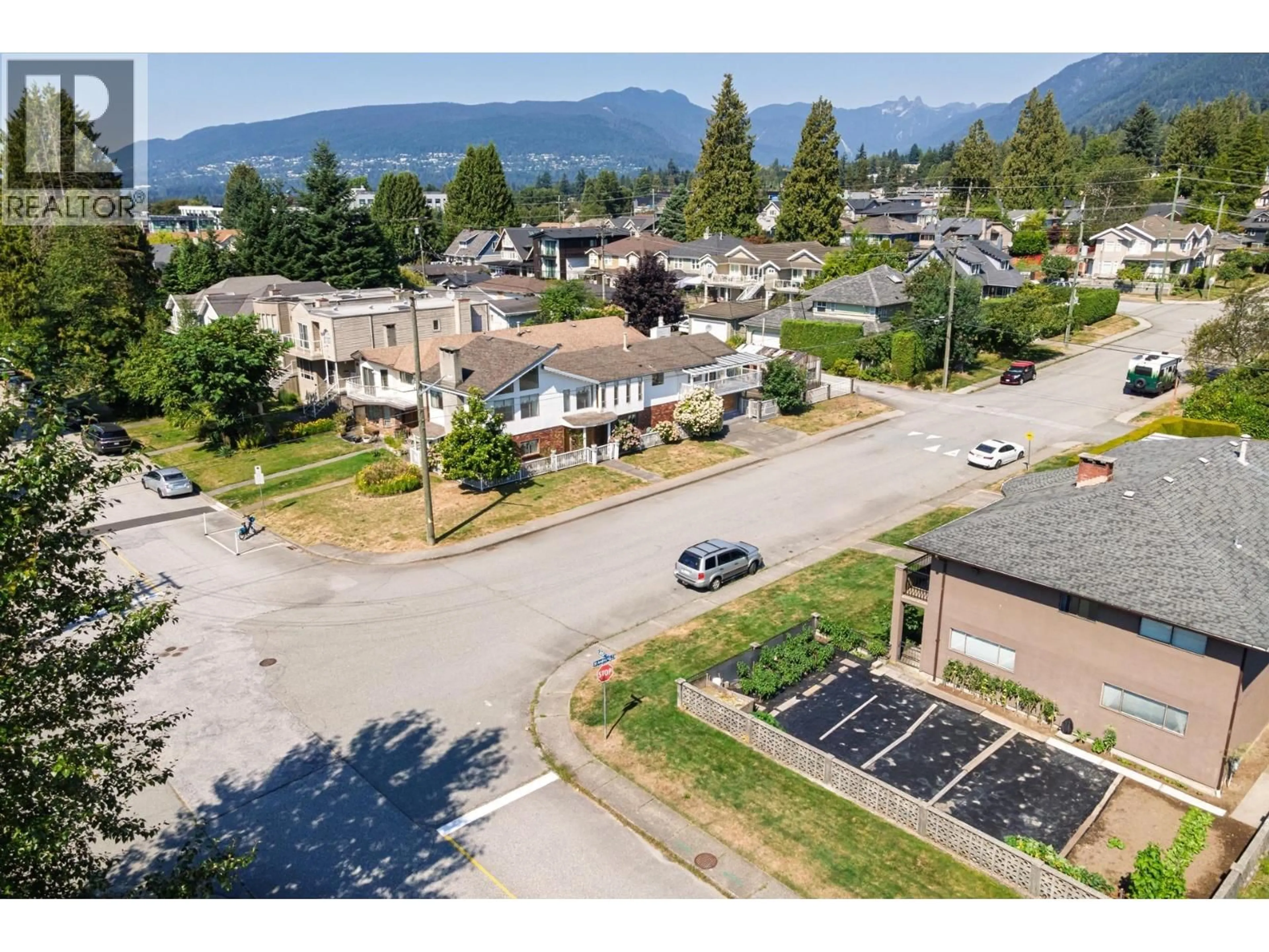 A pic from outside/outdoor area/front of a property/back of a property/a pic from drone, mountain view for 2025 ST. ANDREWS AVENUE, North Vancouver British Columbia V7L3M4