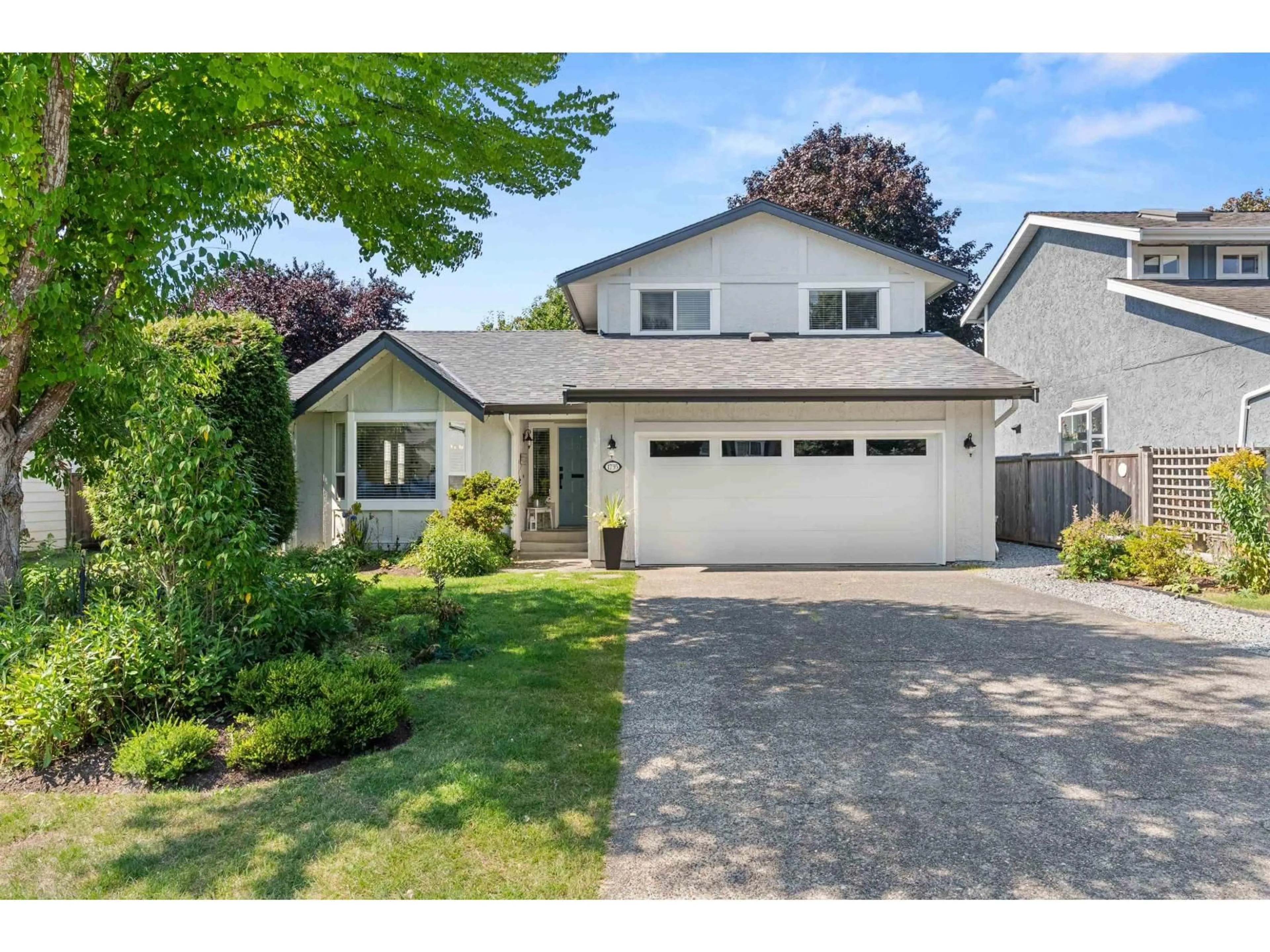 Home with vinyl exterior material, street for 1735 141 A ST, Surrey British Columbia V4A6V1