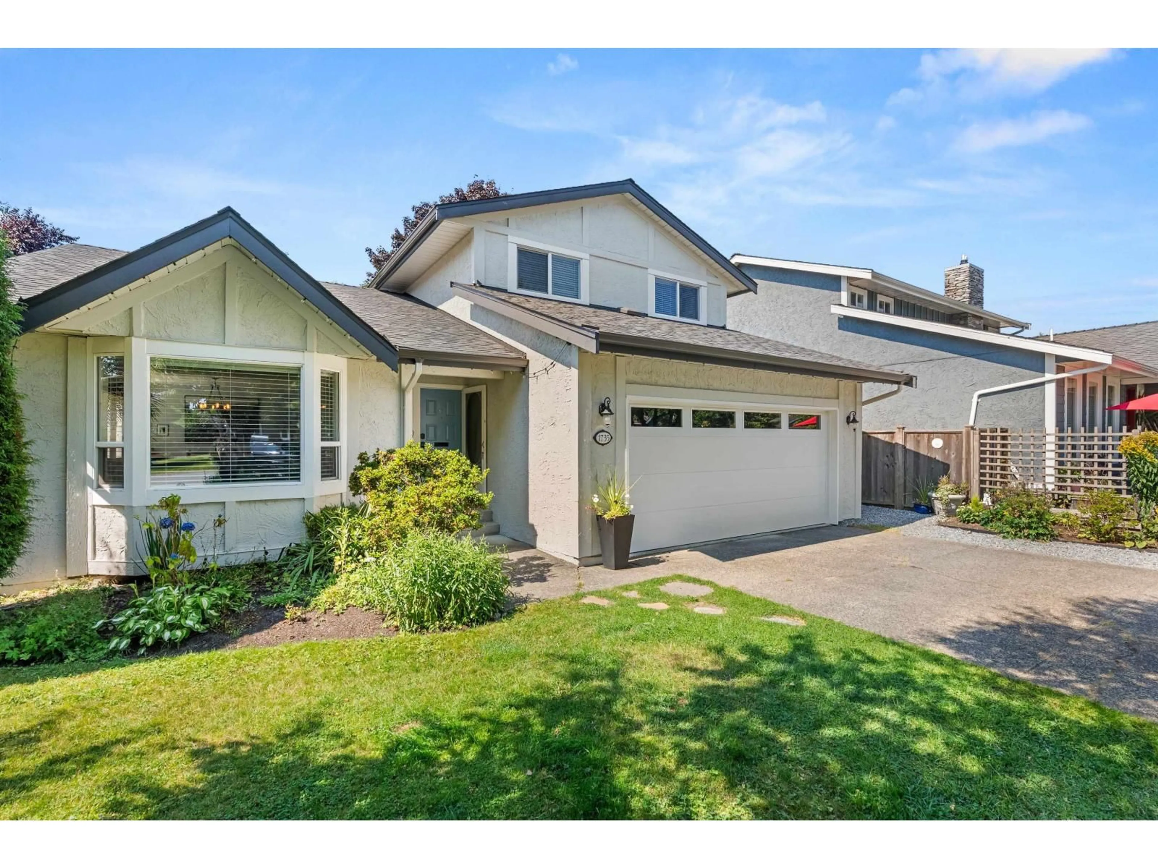 Home with vinyl exterior material, street for 1735 141 A ST, Surrey British Columbia V4A6V1