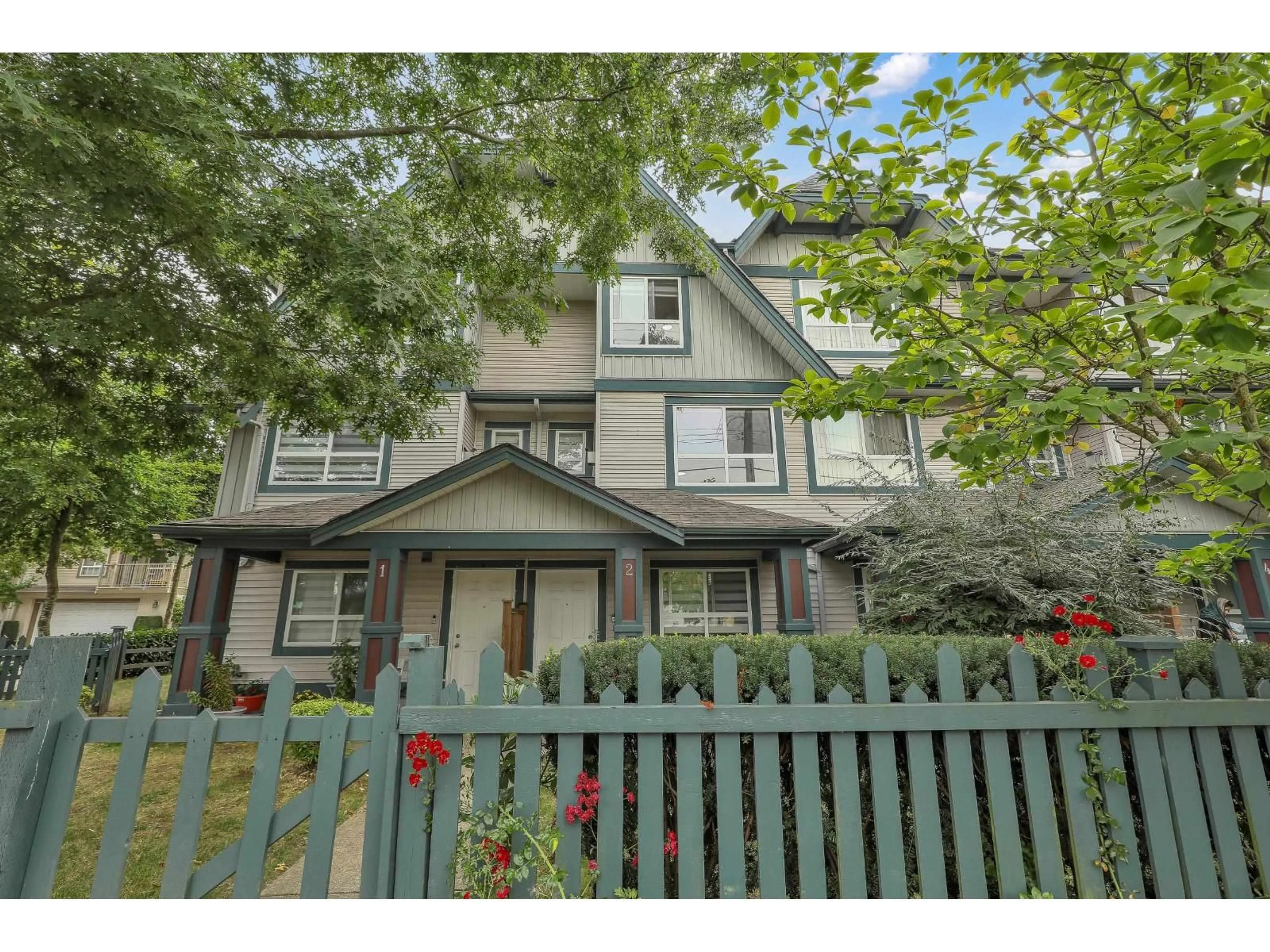 Home with vinyl exterior material, street for 2 - 12730 66, Surrey British Columbia V3W1P2