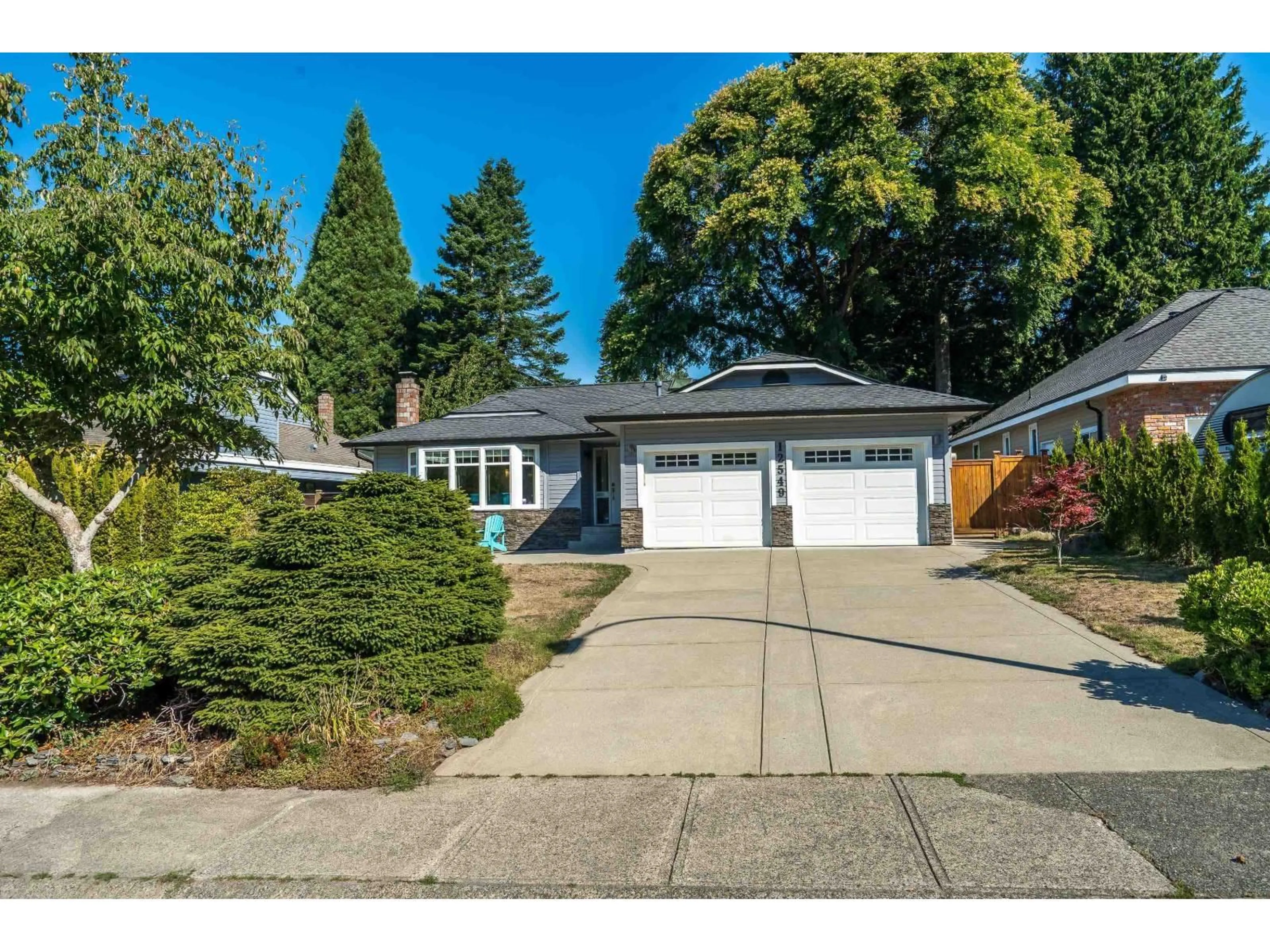 Home with vinyl exterior material, street for 12549 21A, Surrey British Columbia V4A7H6