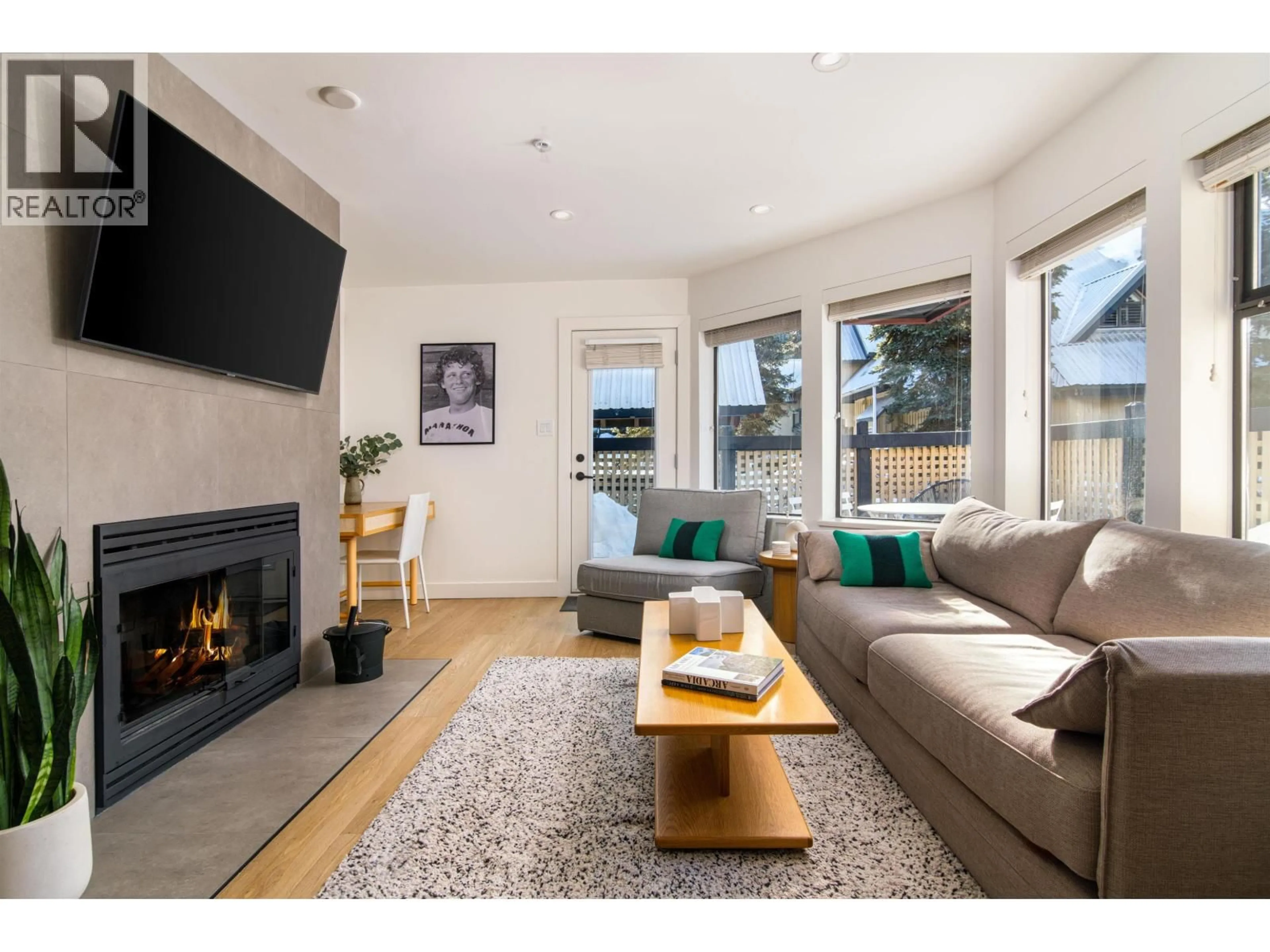 Living room with furniture, wood/laminate floor for 14 - 4637 BLACKCOMB WAY, Whistler British Columbia V8E0Y6