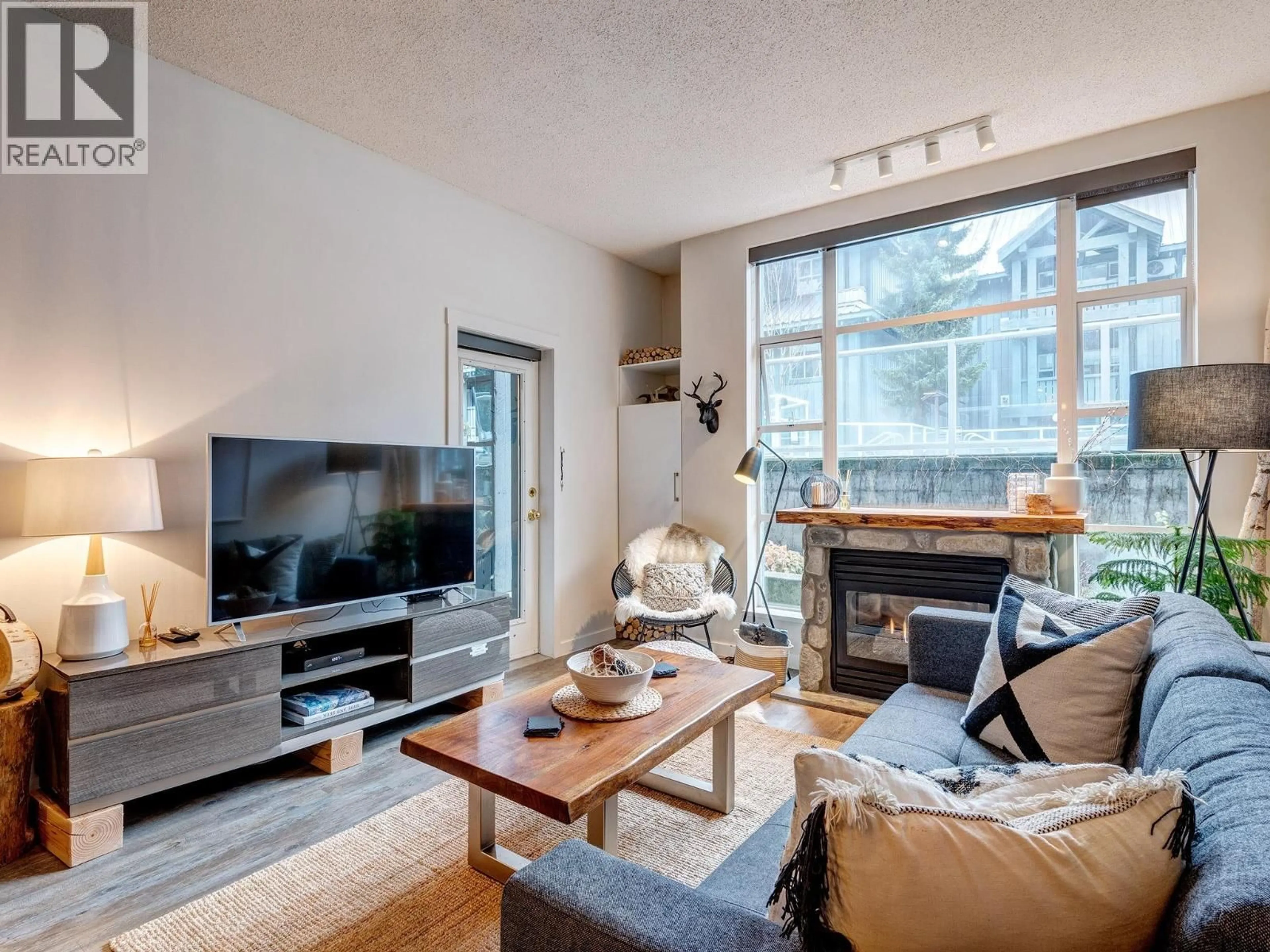 Living room with furniture, unknown for 104 - 4573 CHATEAU BOULEVARD, Whistler British Columbia V8E0Z5