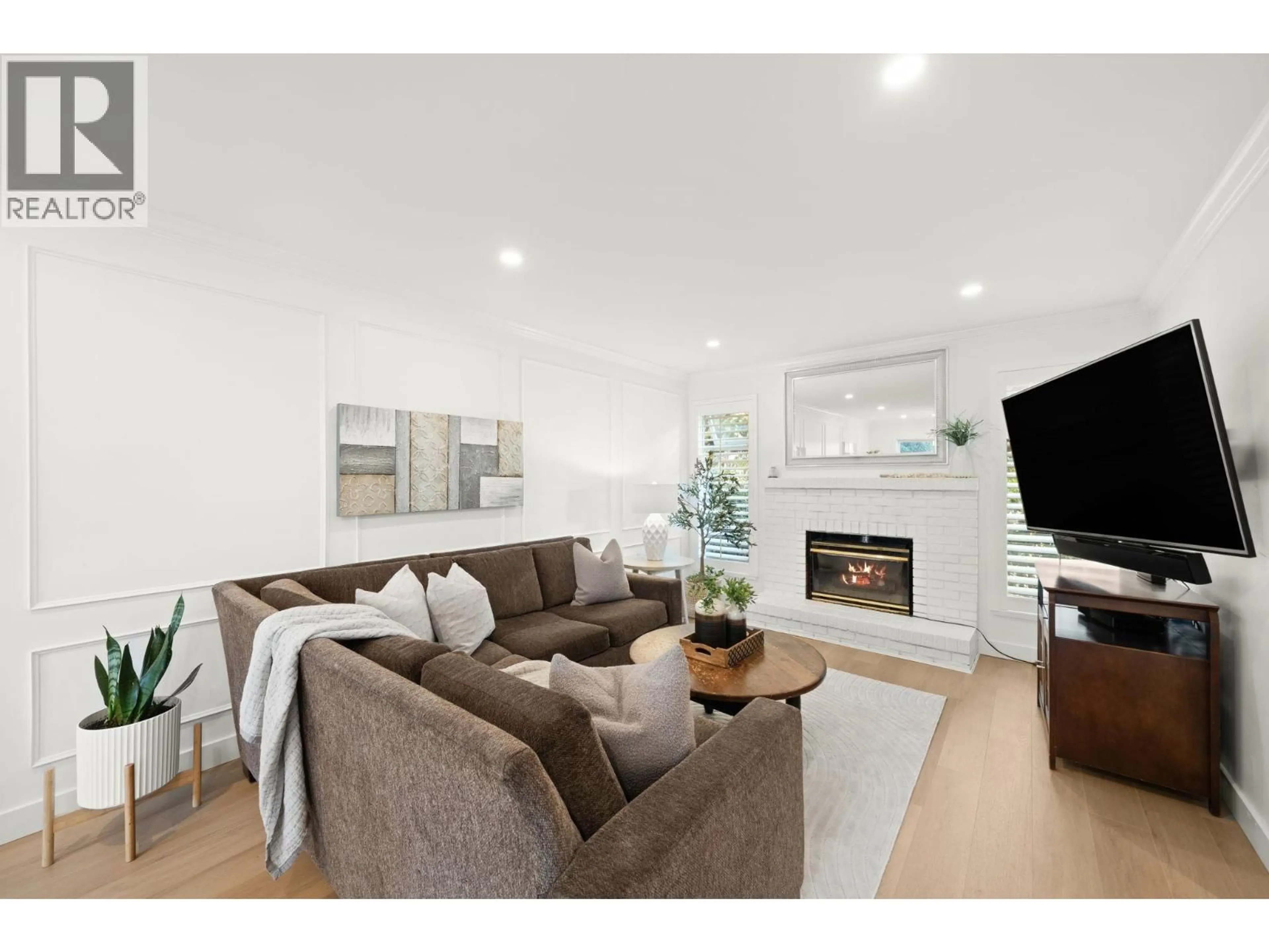 Living room with furniture, wood/laminate floor for 4845 CENTRAL AVENUE, Delta British Columbia V4K2G5