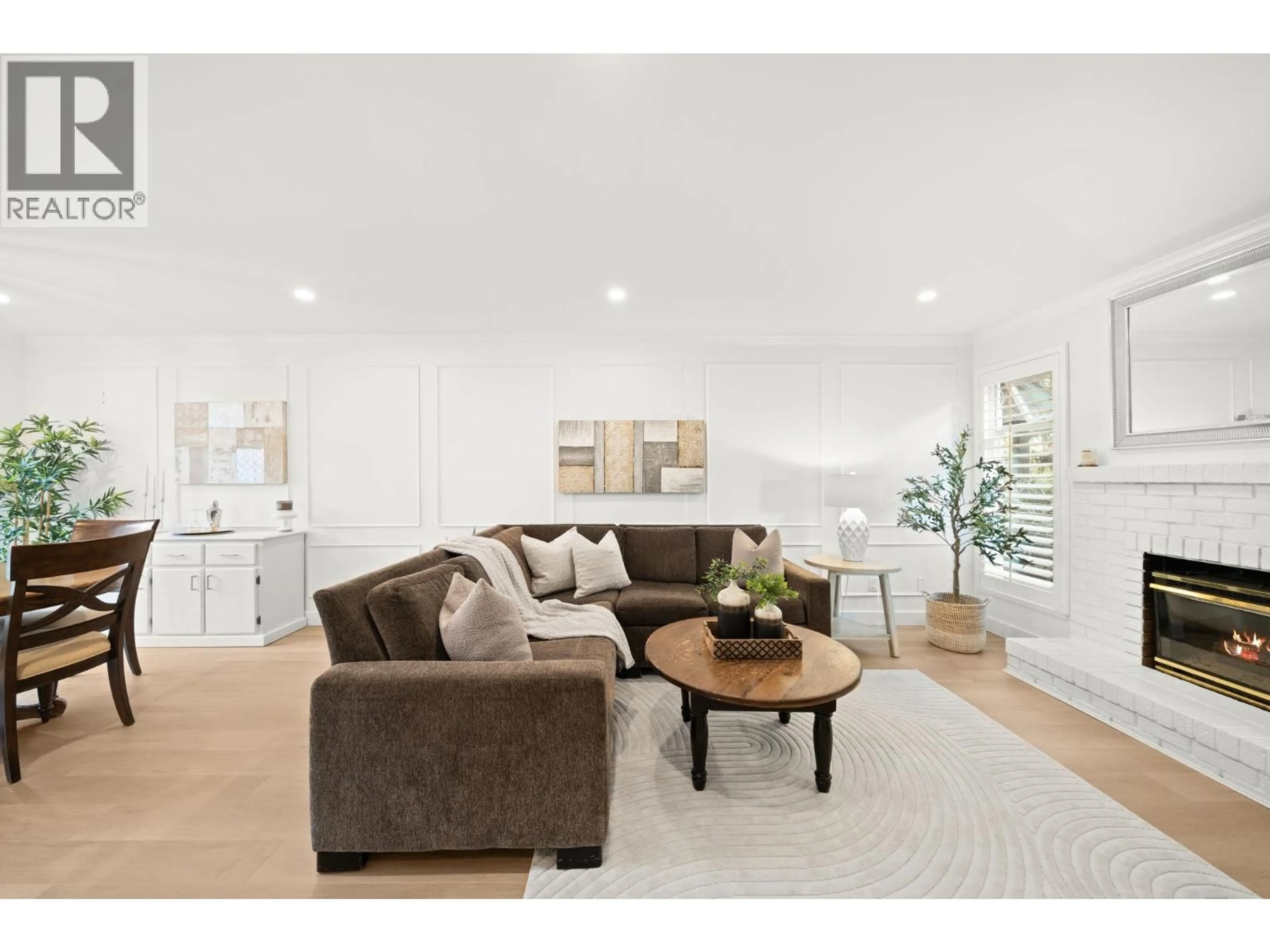 Living room with furniture, wood/laminate floor for 4845 CENTRAL AVENUE, Delta British Columbia V4K2G5