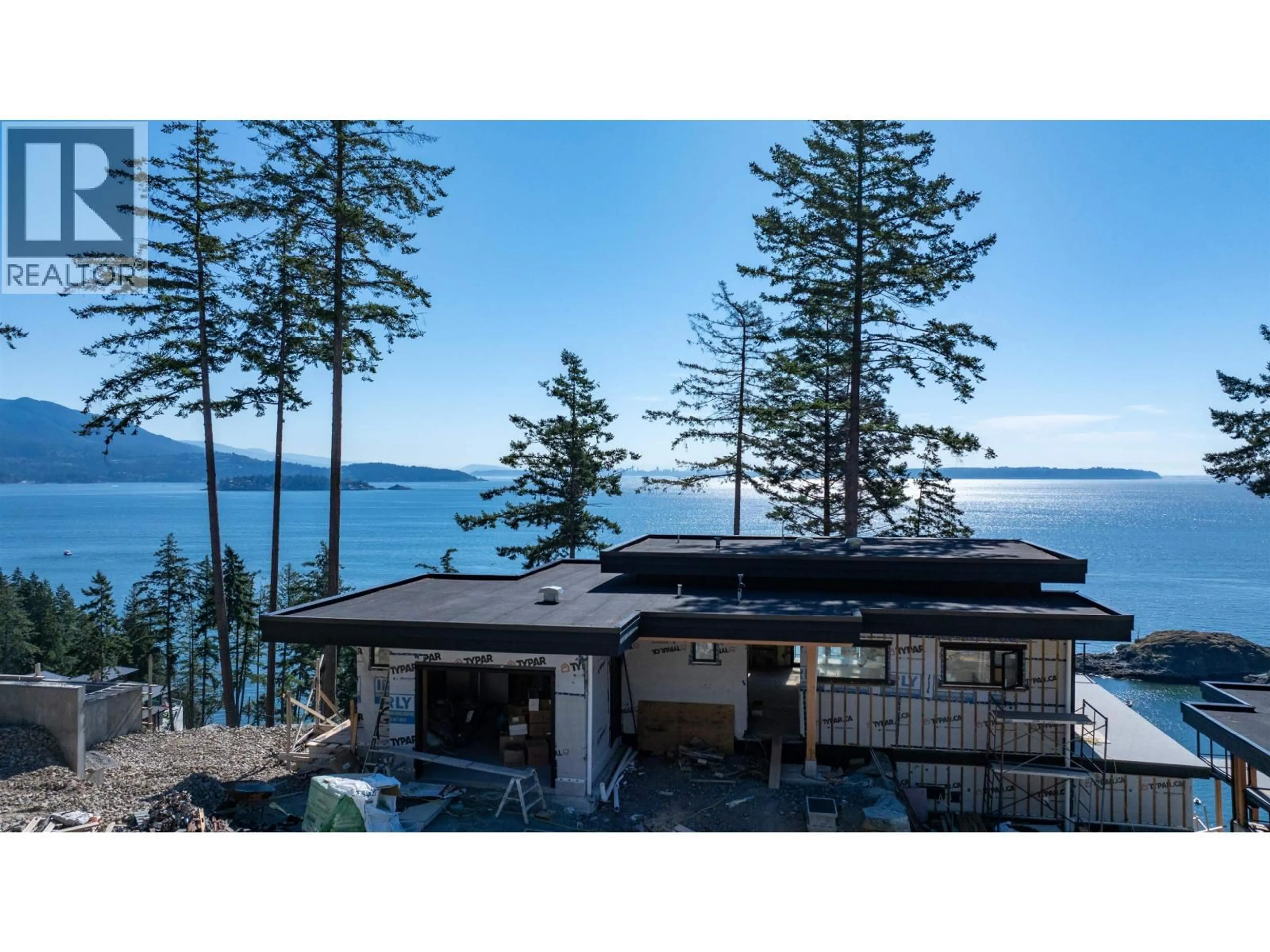 A pic from outside/outdoor area/front of a property/back of a property/a pic from drone, water/lake/river/ocean view for 785 SEYMOUR BAY DRIVE, Bowen Island British Columbia V0N1G2