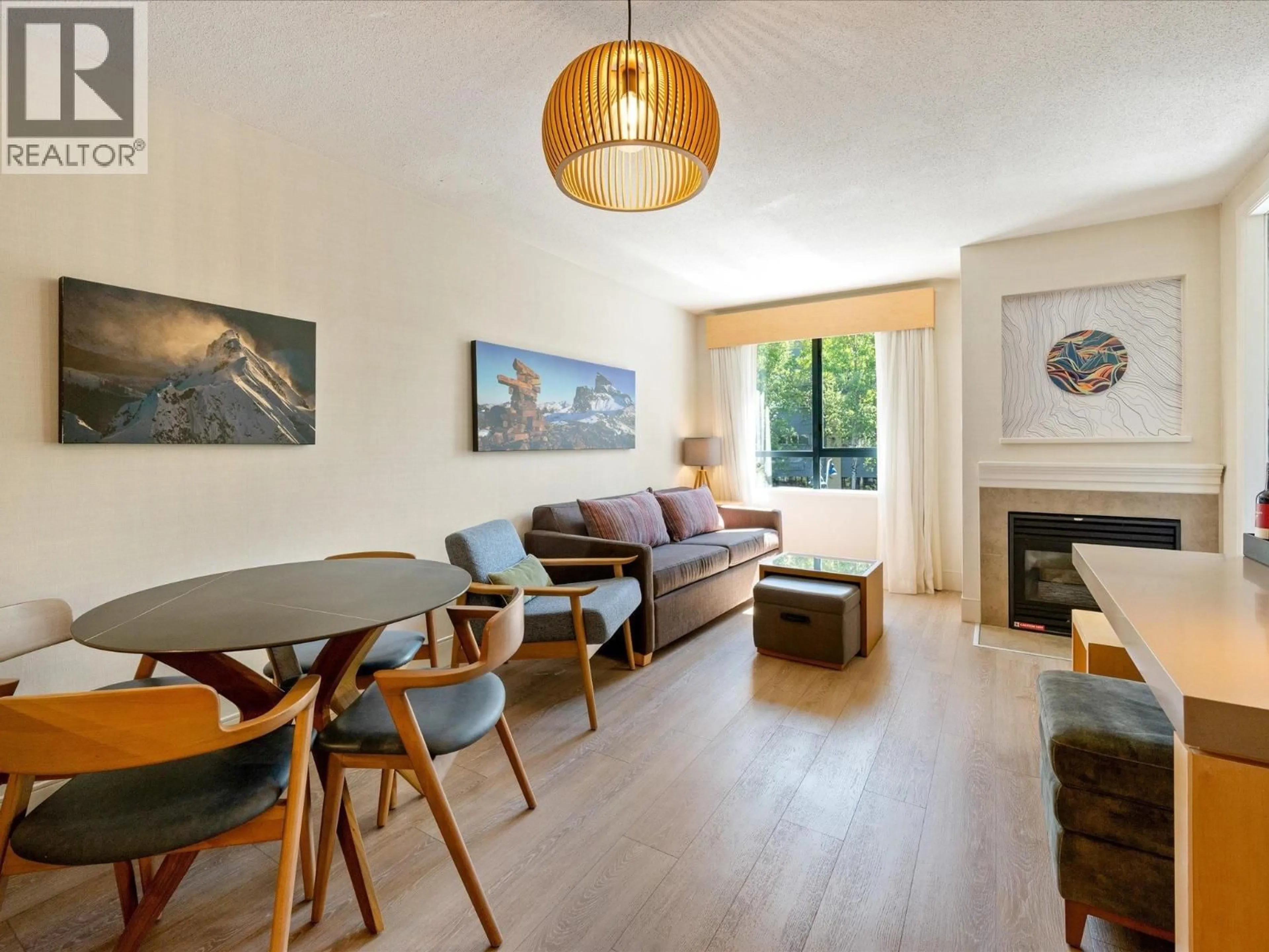 Living room with furniture, wood/laminate floor for 1339/41 - 4308 MAIN STREET, Whistler British Columbia V8E1A9