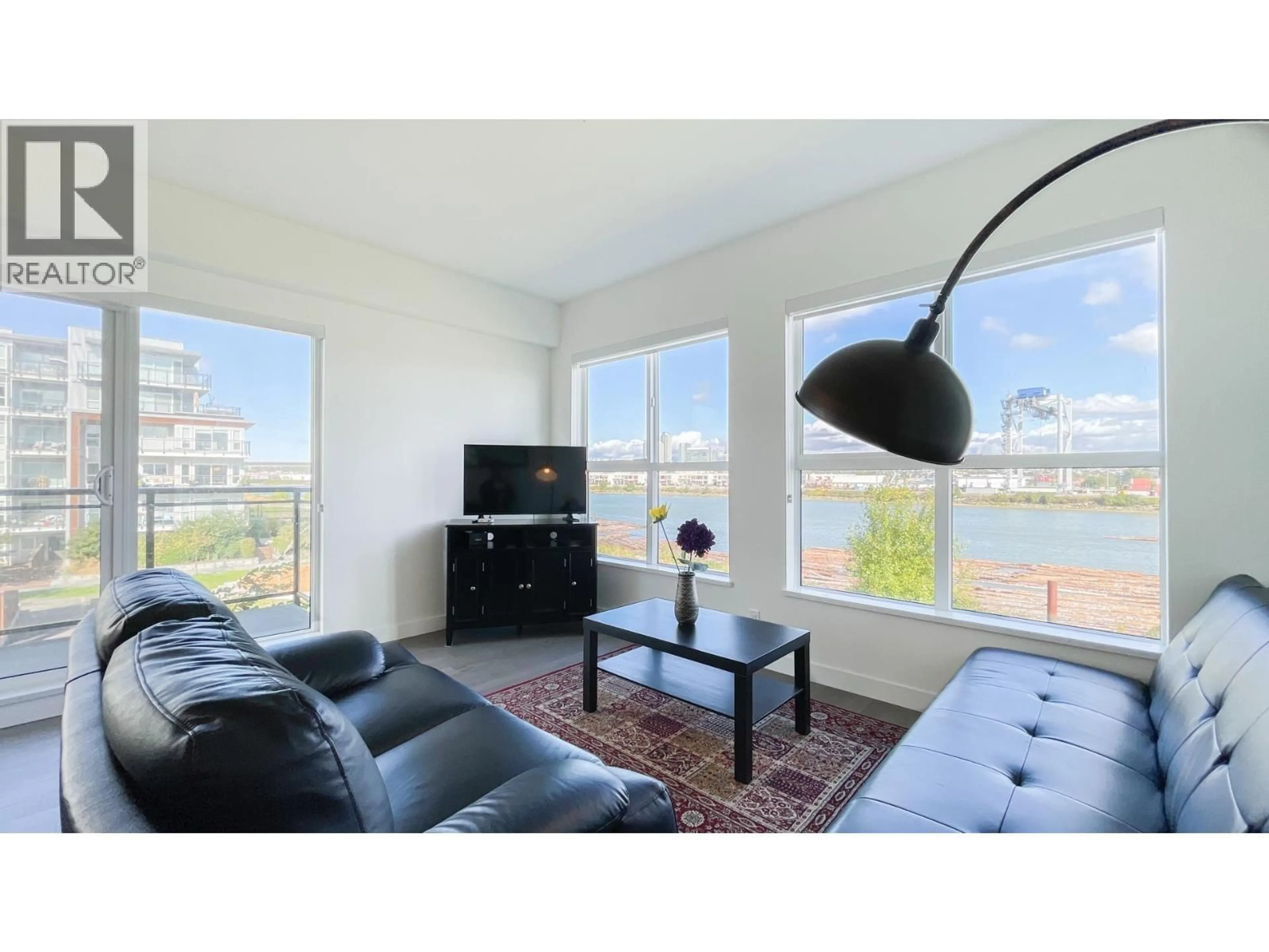 Living room with furniture, wood/laminate floor for 313 - 10177 RIVER DRIVE, Richmond British Columbia V6X0S2