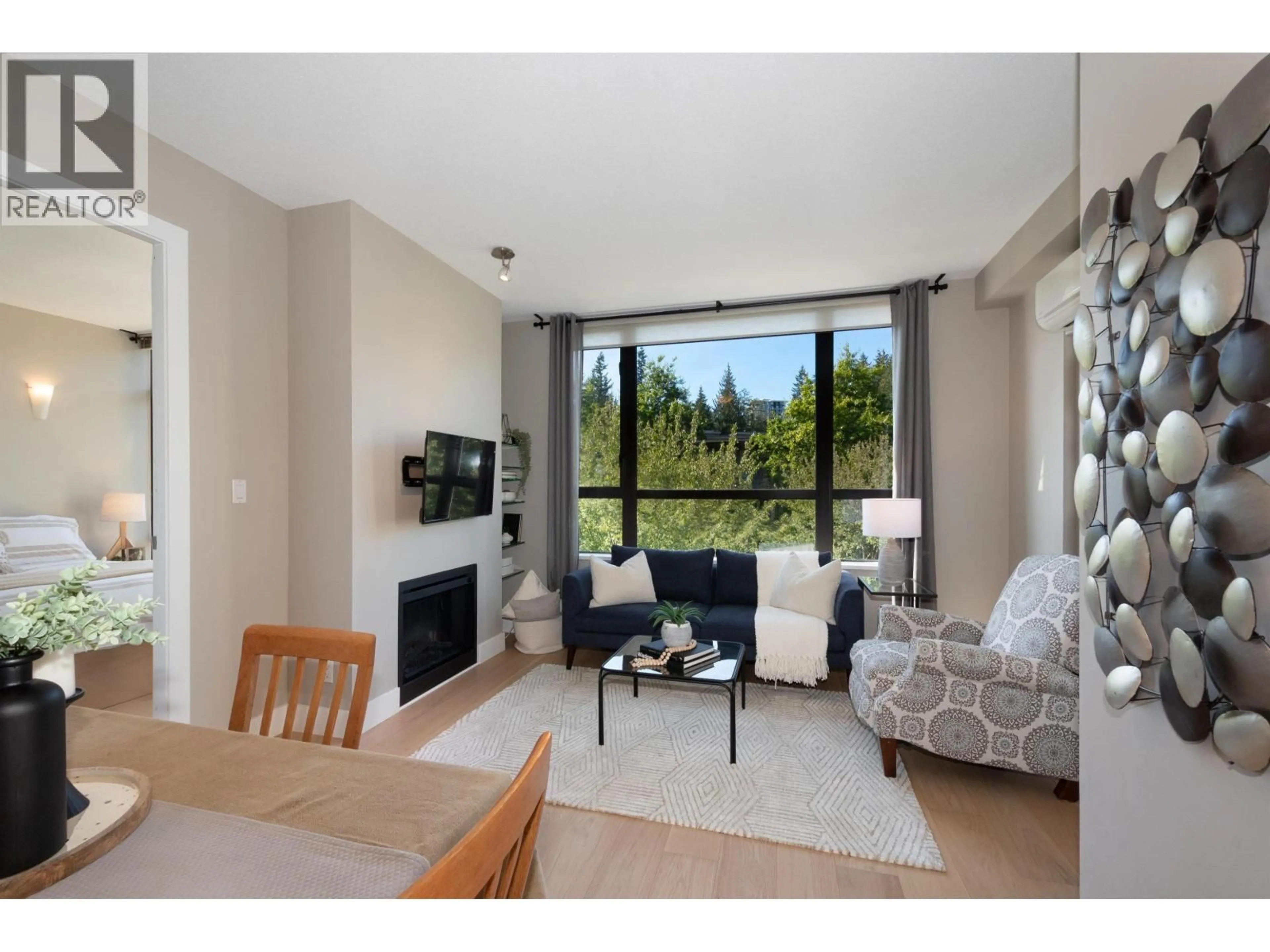 Living room with furniture, unknown for 501 - 9370 UNIVERSITY CRESCENT, Burnaby British Columbia V5A4X9
