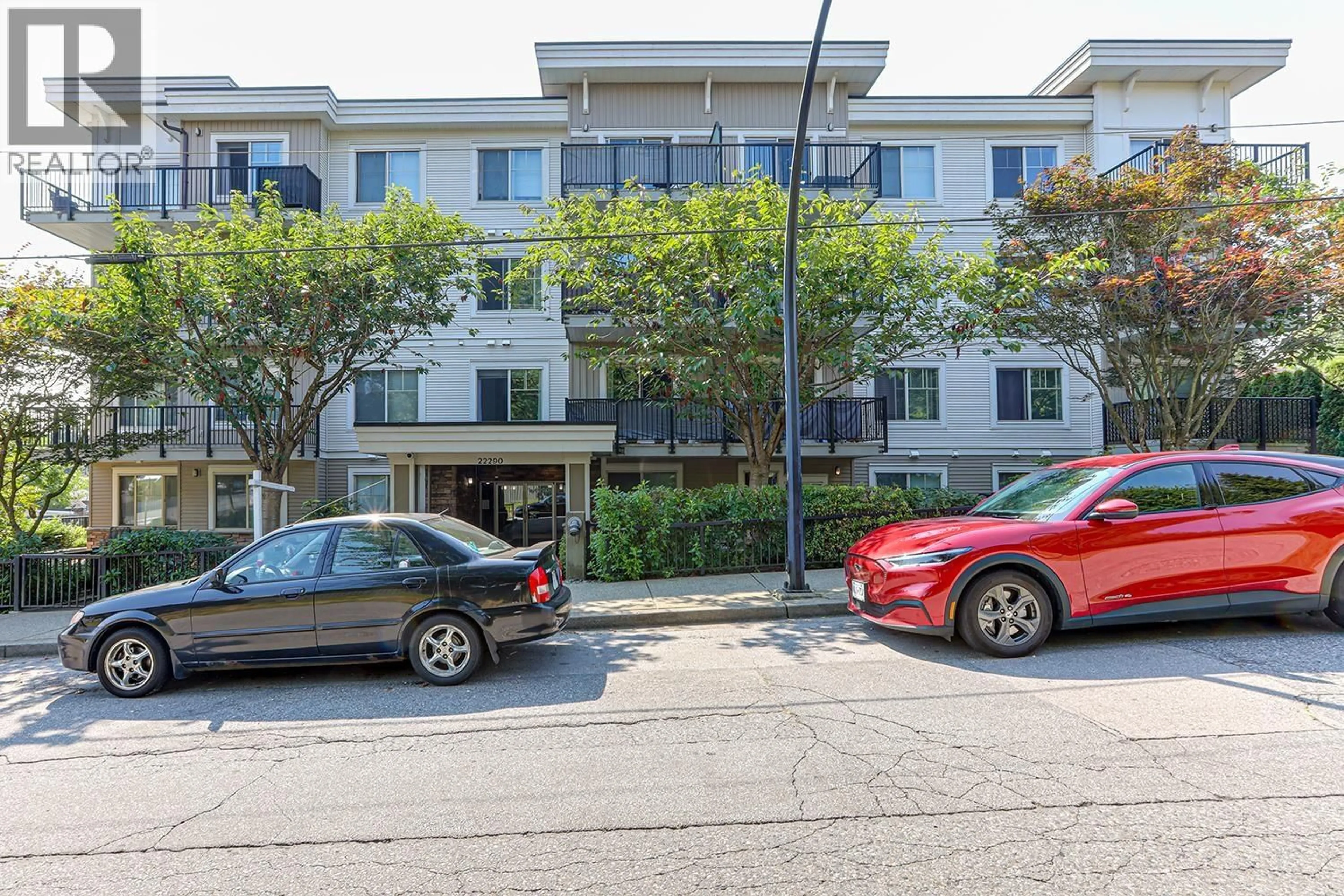 A pic from outside/outdoor area/front of a property/back of a property/a pic from drone, street for 307 - 22290 NORTH AVENUE, Maple Ridge British Columbia V2X8Z8
