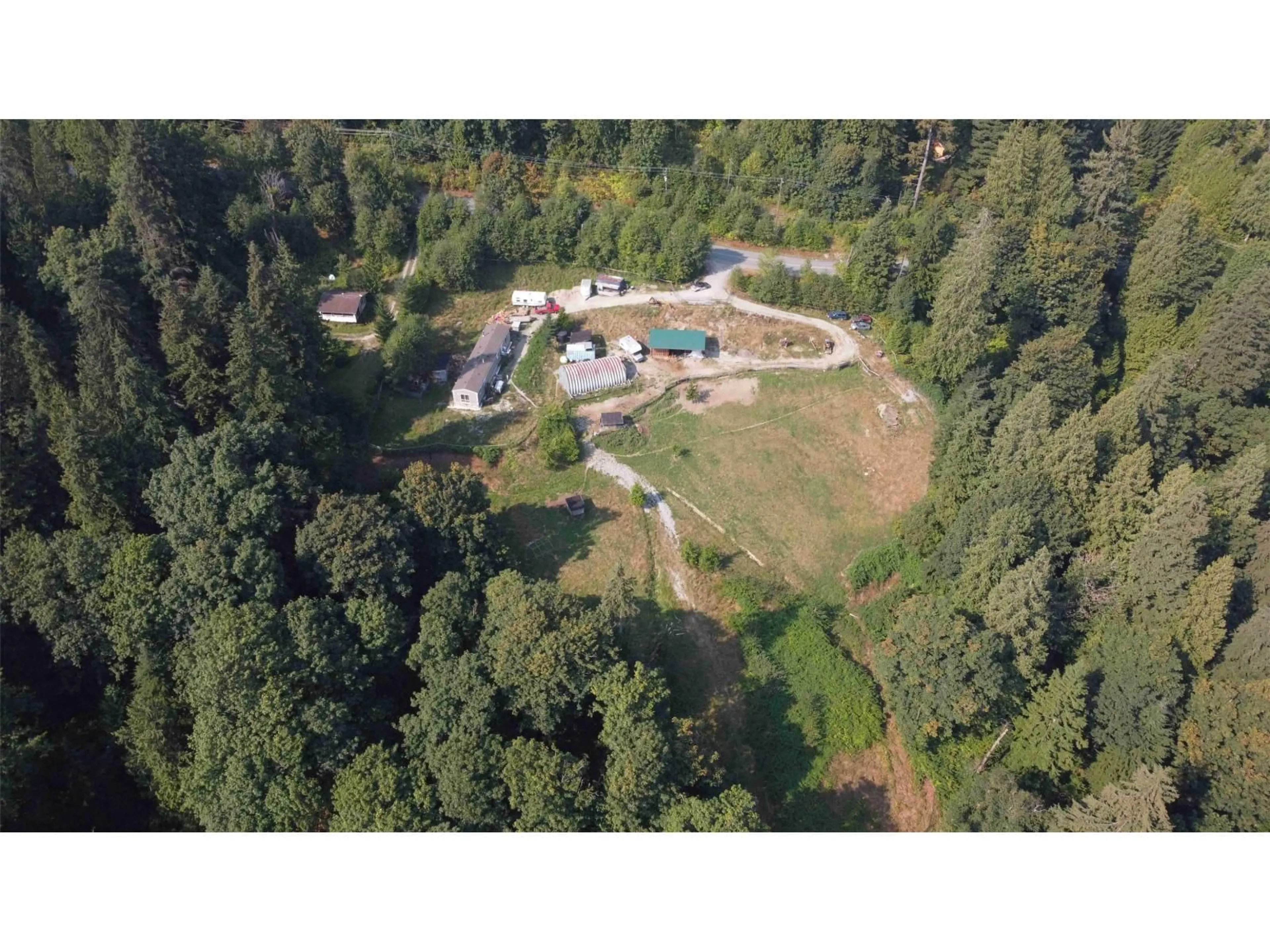 A pic from outside/outdoor area/front of a property/back of a property/a pic from drone, forest/trees view for 10394 STAVE LAKE, Mission British Columbia V2V0B5