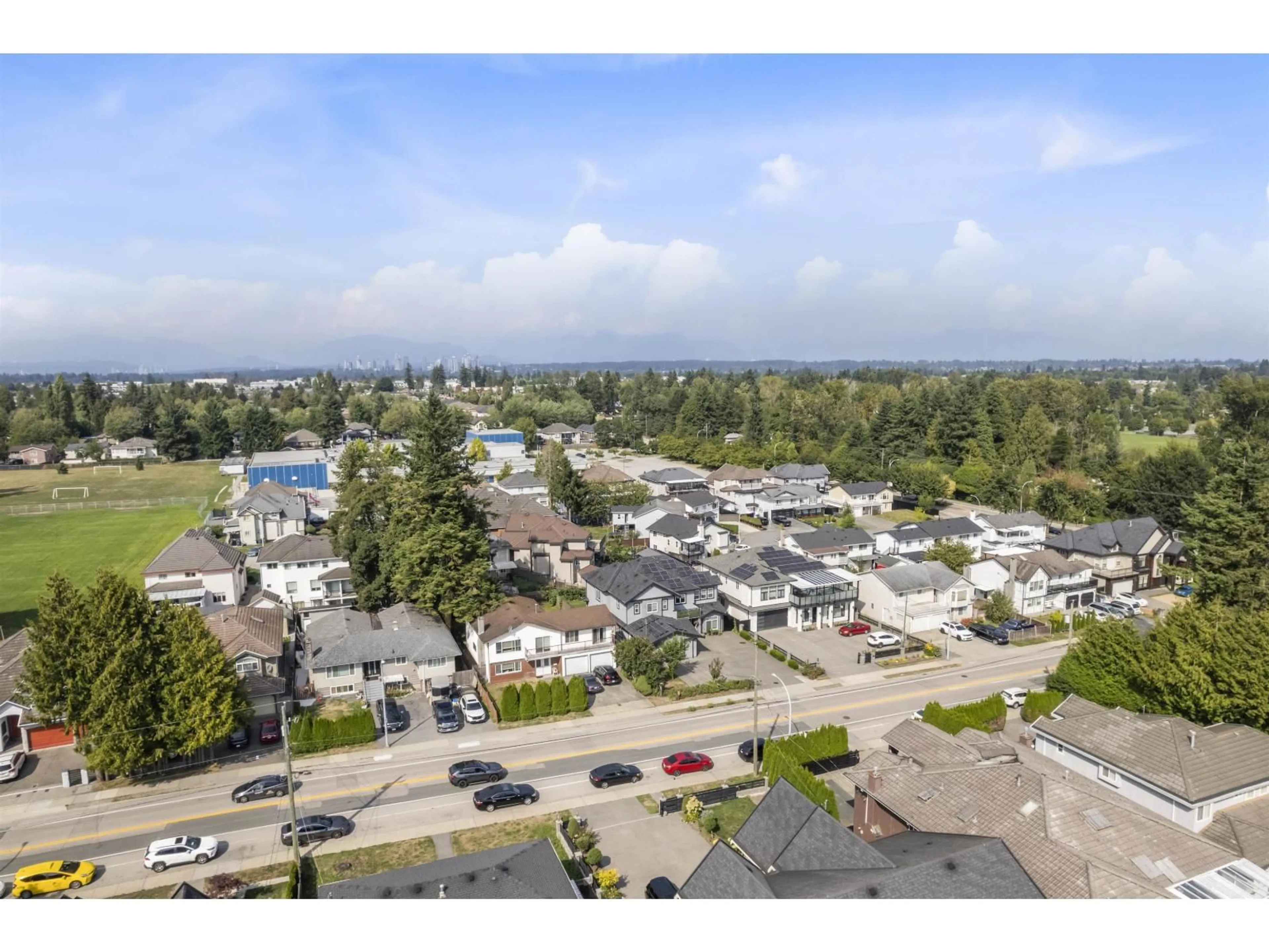 A pic from outside/outdoor area/front of a property/back of a property/a pic from drone, mountain view for 13145 68, Surrey British Columbia V3W2E5