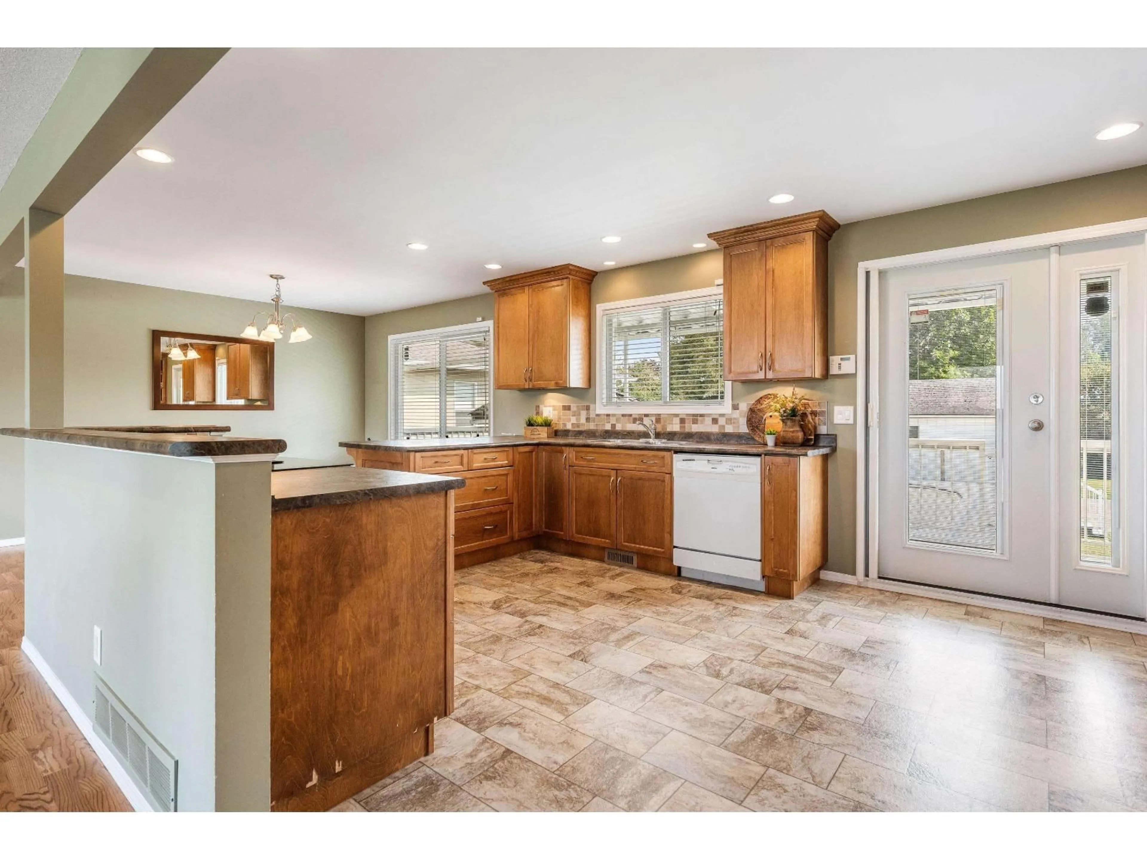 Open concept kitchen, ceramic/tile floor for 10338 MCSWEEN ROAD, Chilliwack British Columbia V2P6H5