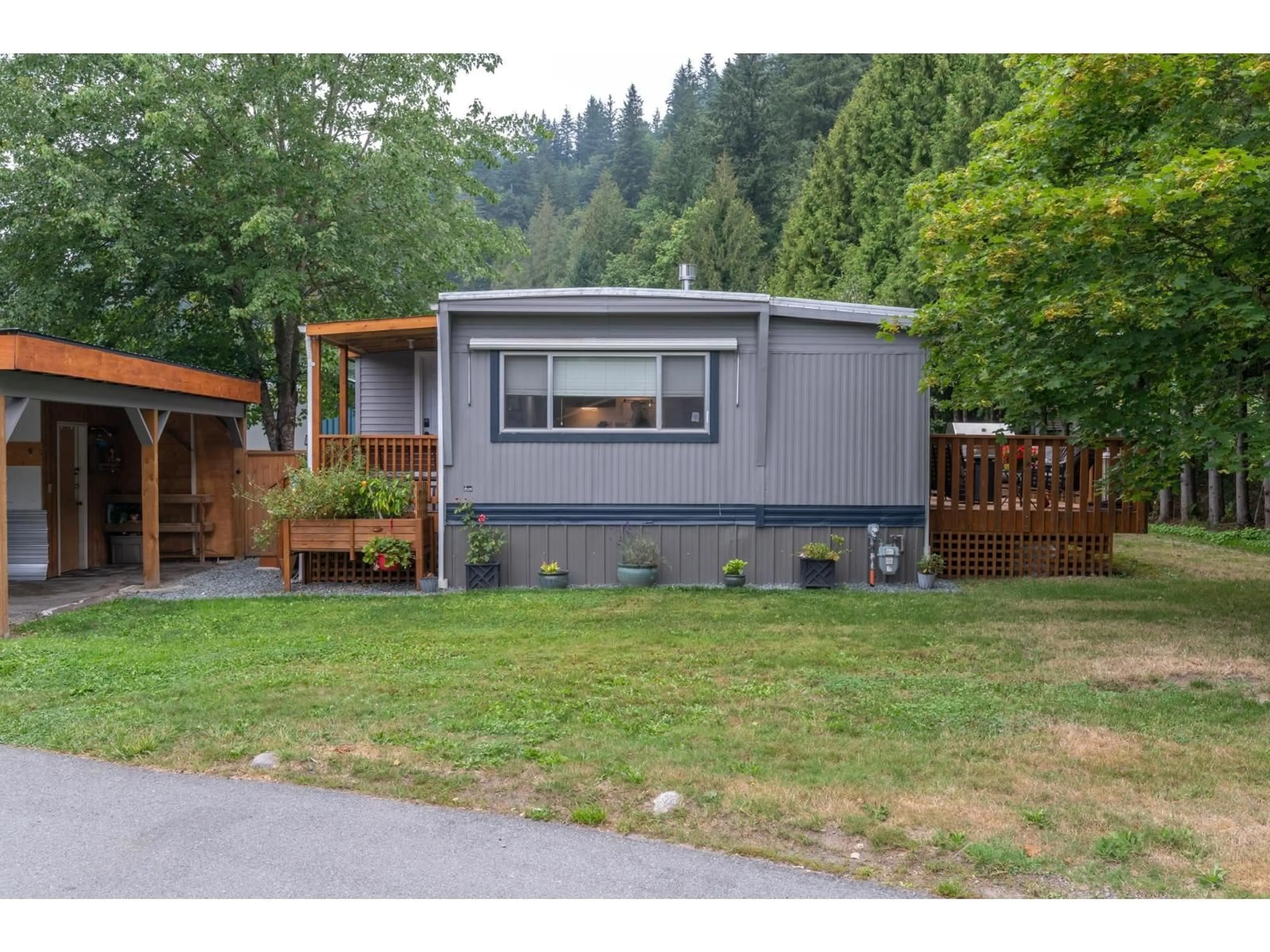 Home with vinyl exterior material, mountain view for 106 - 46511 CHILLIWACK LAKE ROAD, Chilliwack British Columbia V2R3S5