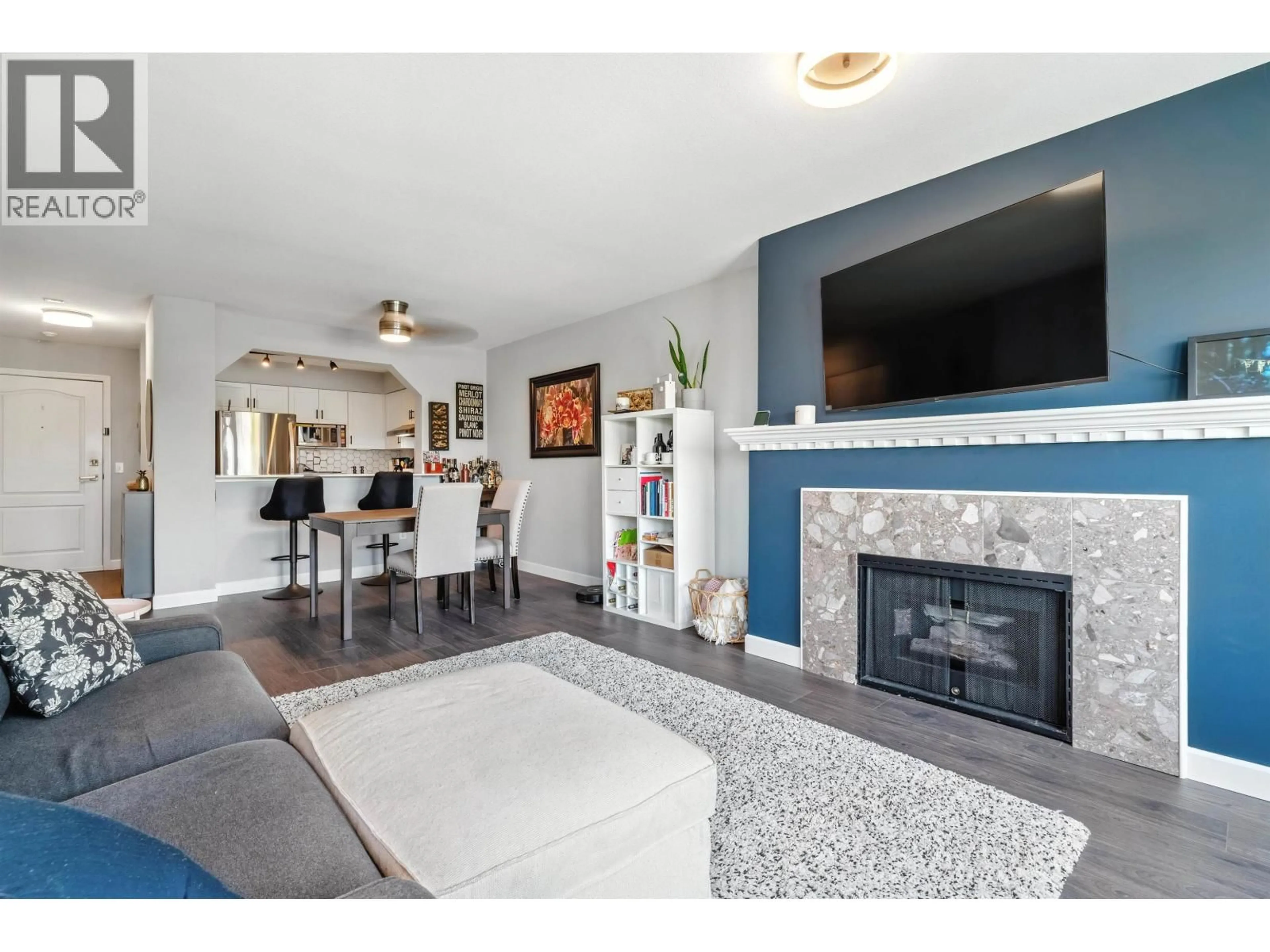 Living room with furniture, ceramic/tile floor for 220 - 3770 MANOR STREET, Burnaby British Columbia V5G4T5