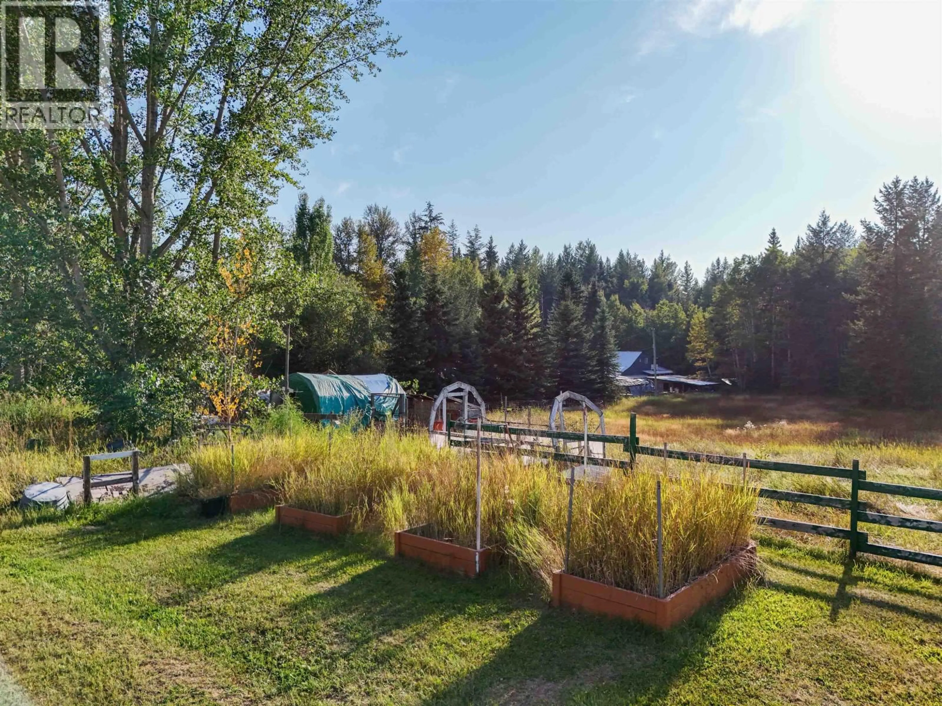 A pic from outside/outdoor area/front of a property/back of a property/a pic from drone, forest/trees view for 2412 RED BLUFF ROAD, Quesnel British Columbia V2J6C2