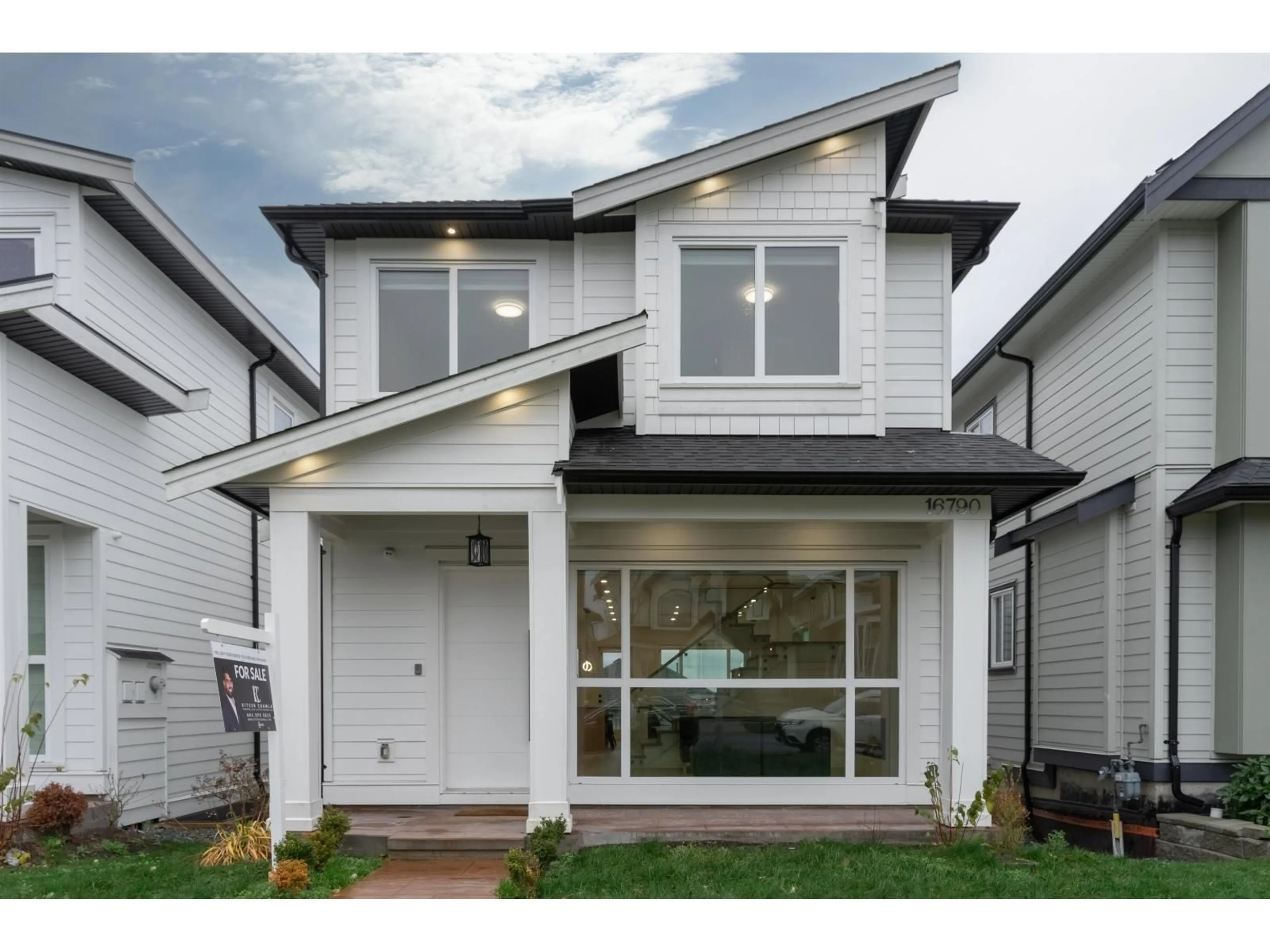 Home with vinyl exterior material, street for 16790 20A, Surrey British Columbia V3Z1H1
