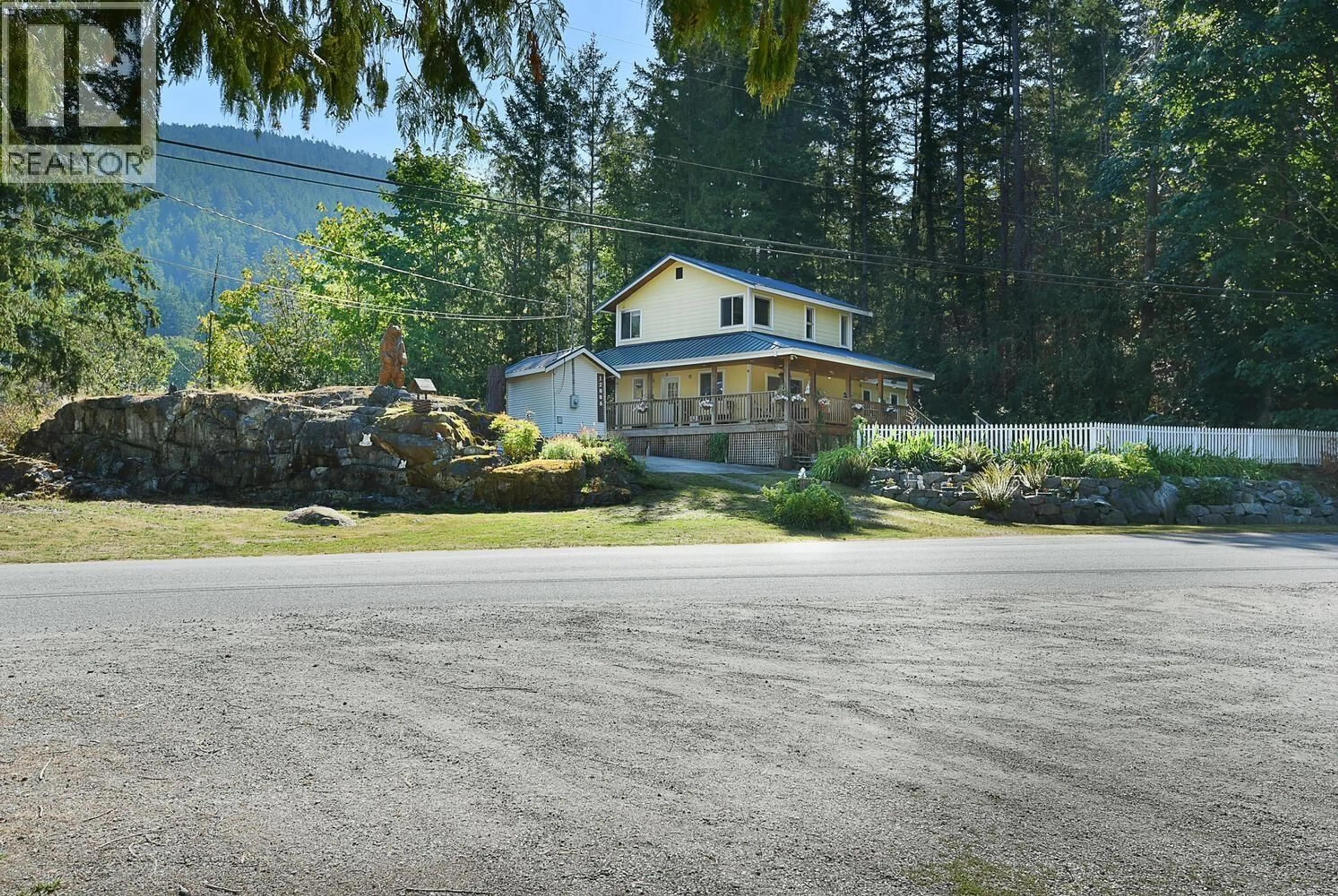 A pic from outside/outdoor area/front of a property/back of a property/a pic from drone, mountain view for 12866 LAGOON ROAD, Madeira Park British Columbia V0N2H1