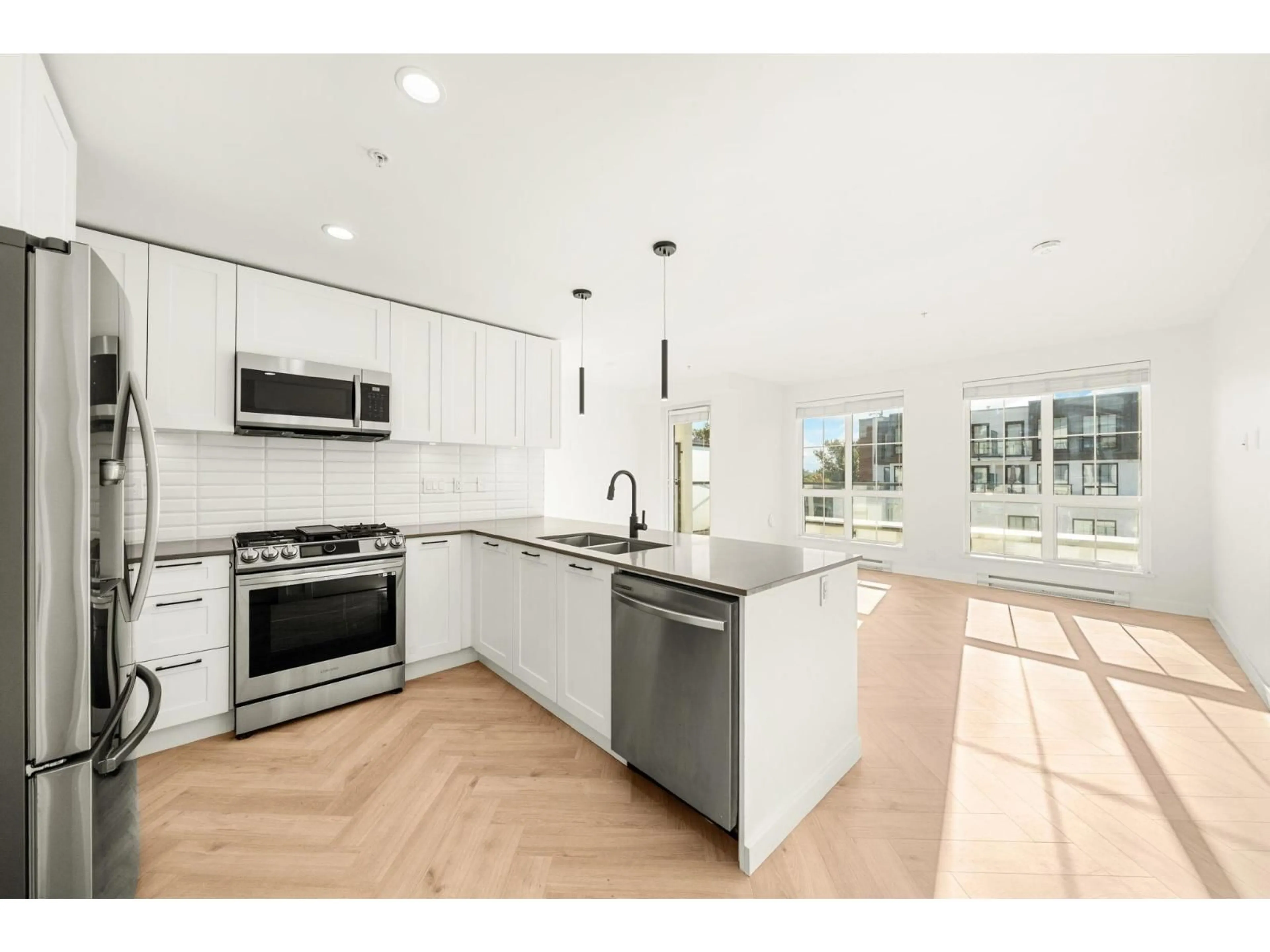 Open concept kitchen, unknown for 504 - 8353 200A, Langley British Columbia V2Y5K7
