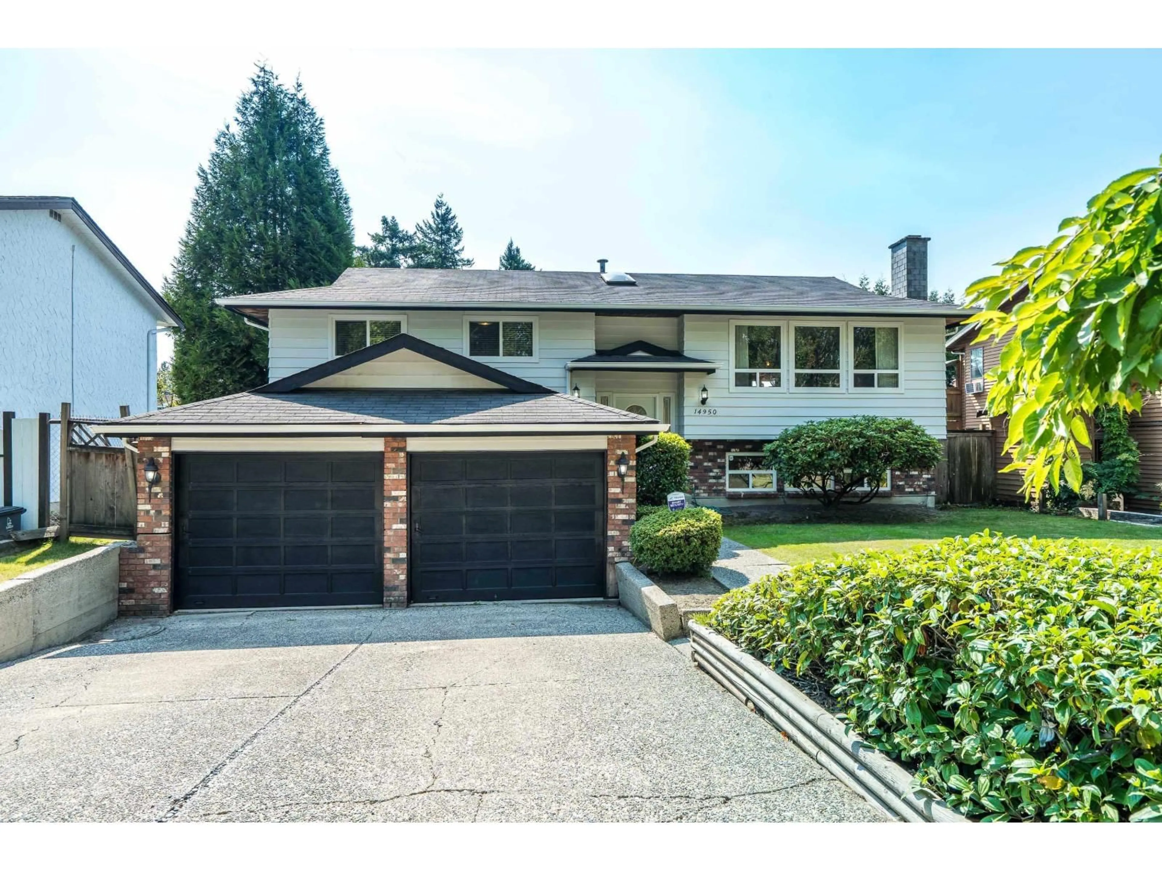 Home with vinyl exterior material, street for 14950 92A, Surrey British Columbia V3R7A5