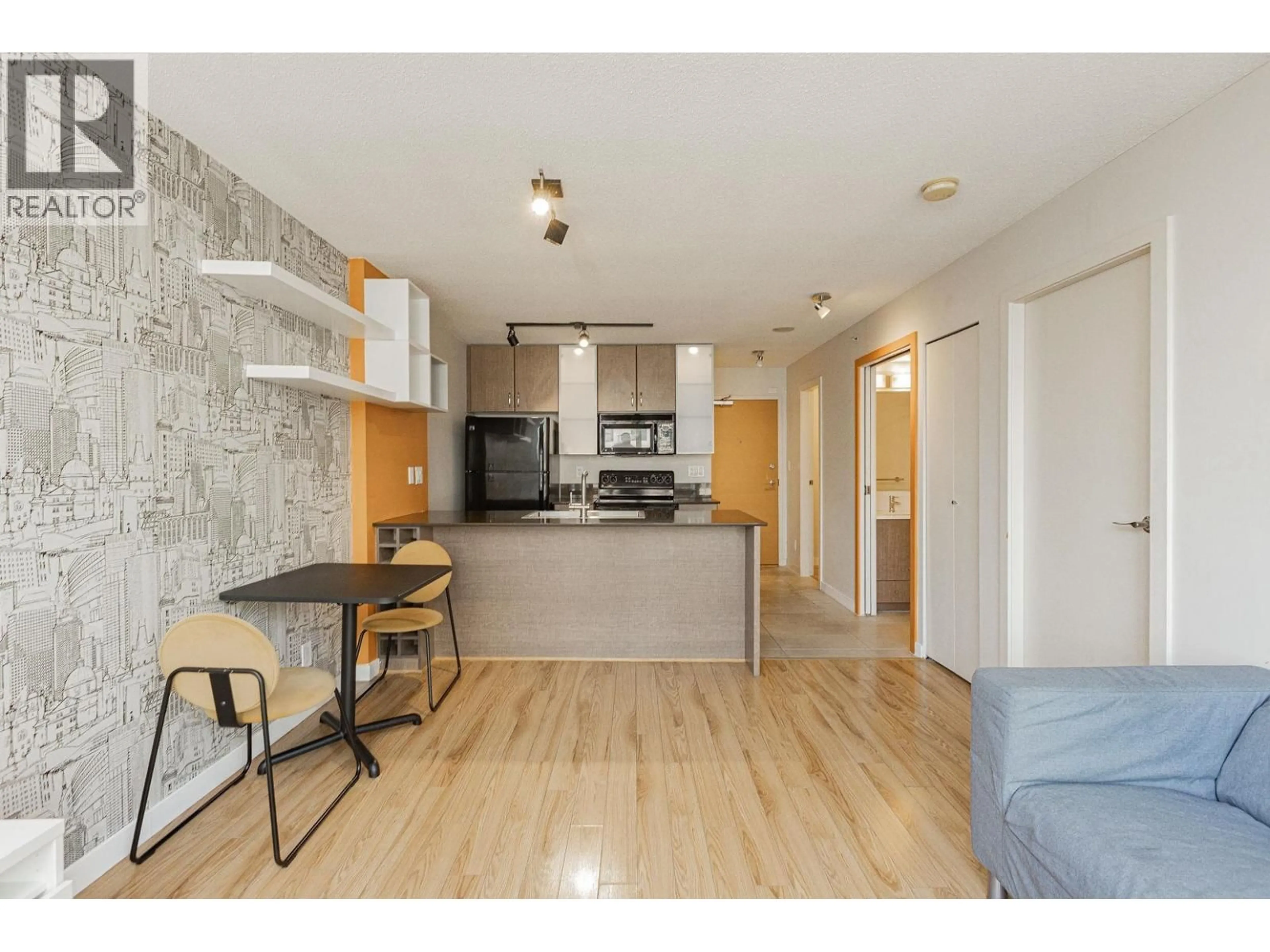 Open concept kitchen, wood/laminate floor for 2304 - 977 MAINLAND STREET, Vancouver British Columbia V6B1T2