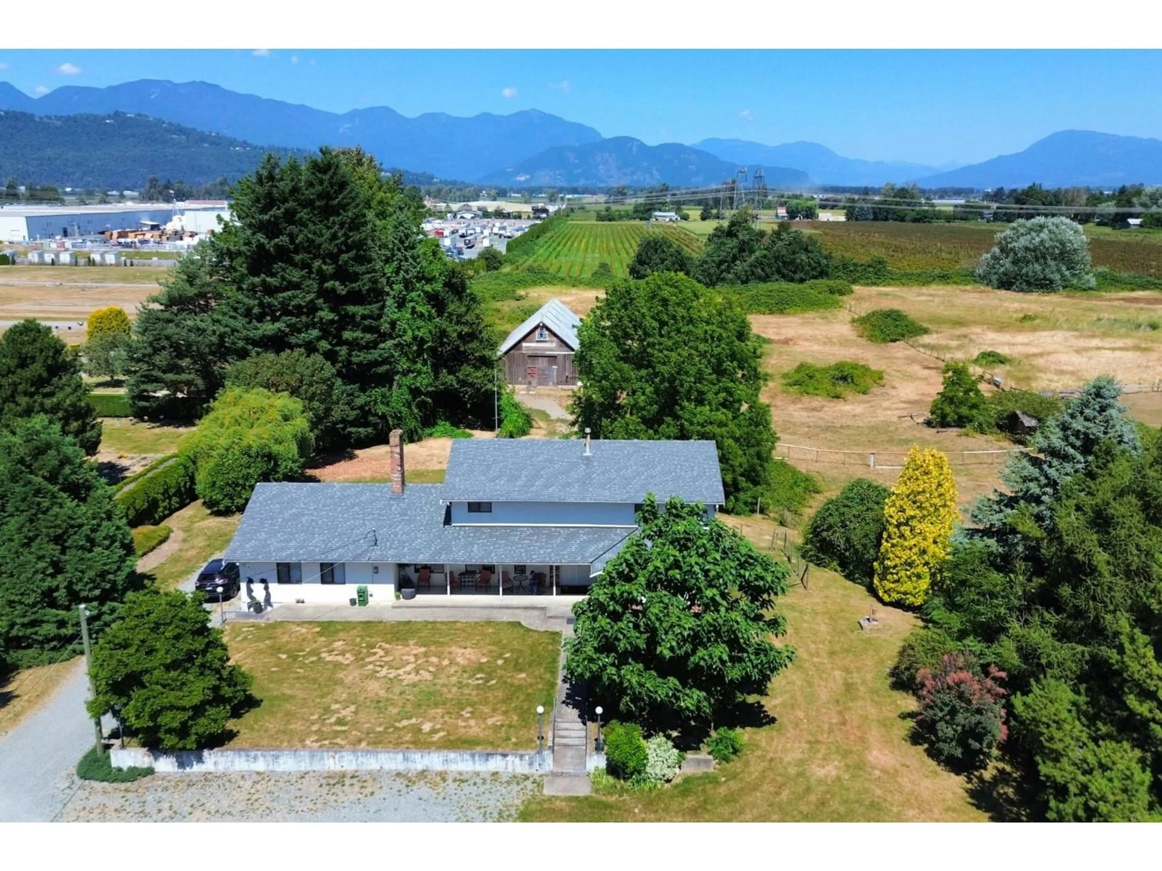 A pic from outside/outdoor area/front of a property/back of a property/a pic from drone, mountain view for 44705 WATSON ROAD, Chilliwack British Columbia V2R2Y6