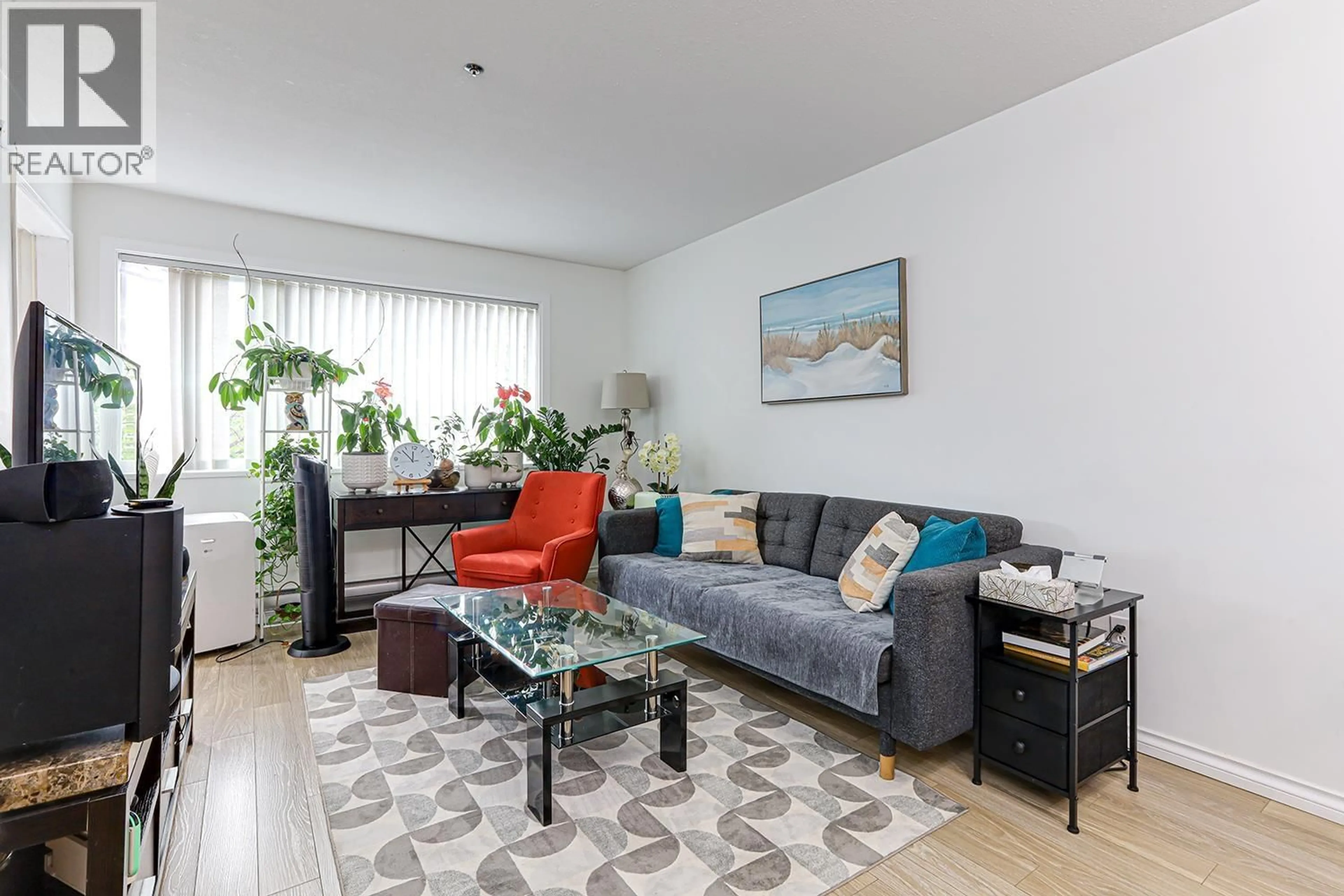Living room with furniture, unknown for 614 - 1310 CARIBOO STREET, New Westminster British Columbia V3M1X2