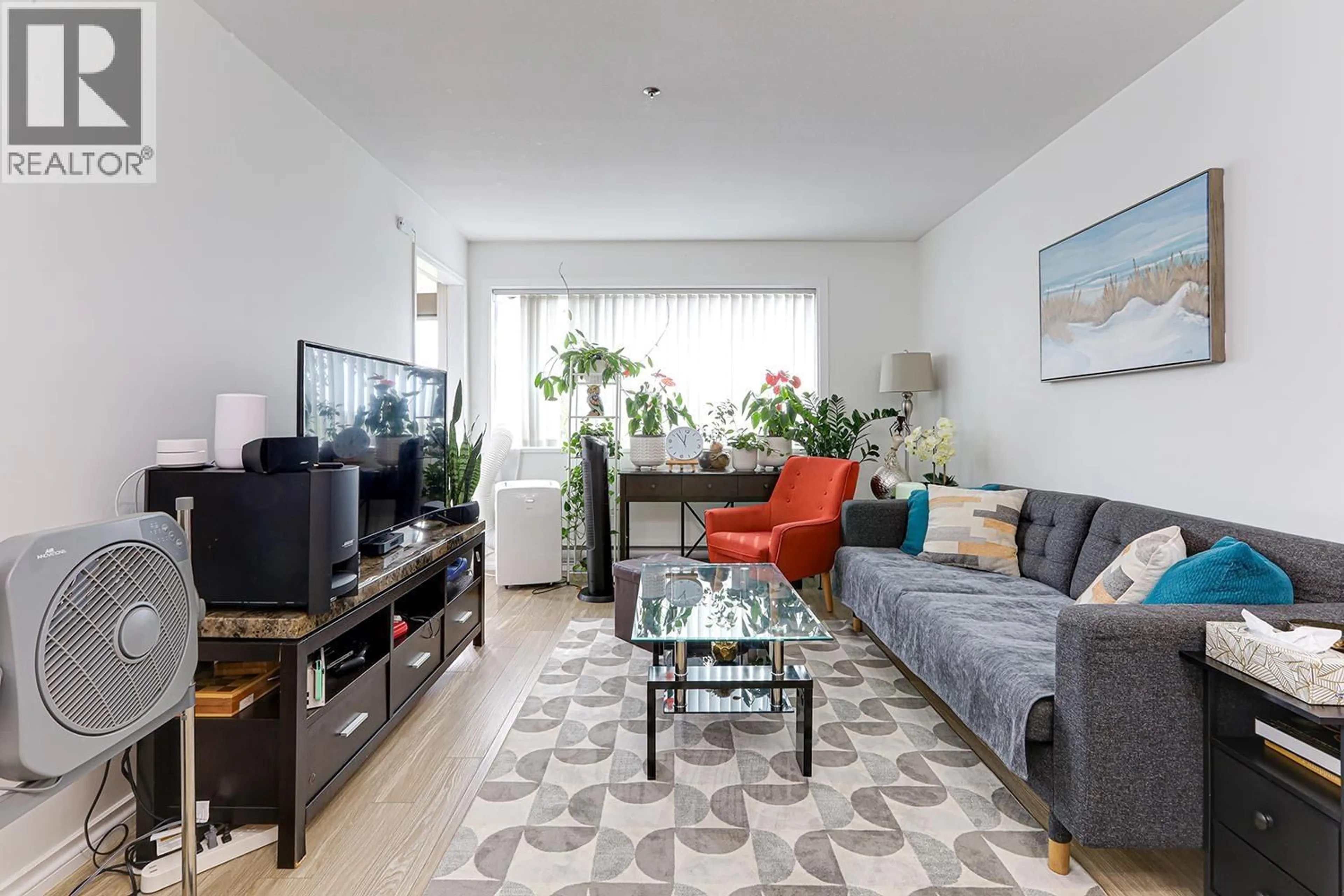 Living room with furniture, unknown for 614 - 1310 CARIBOO STREET, New Westminster British Columbia V3M1X2