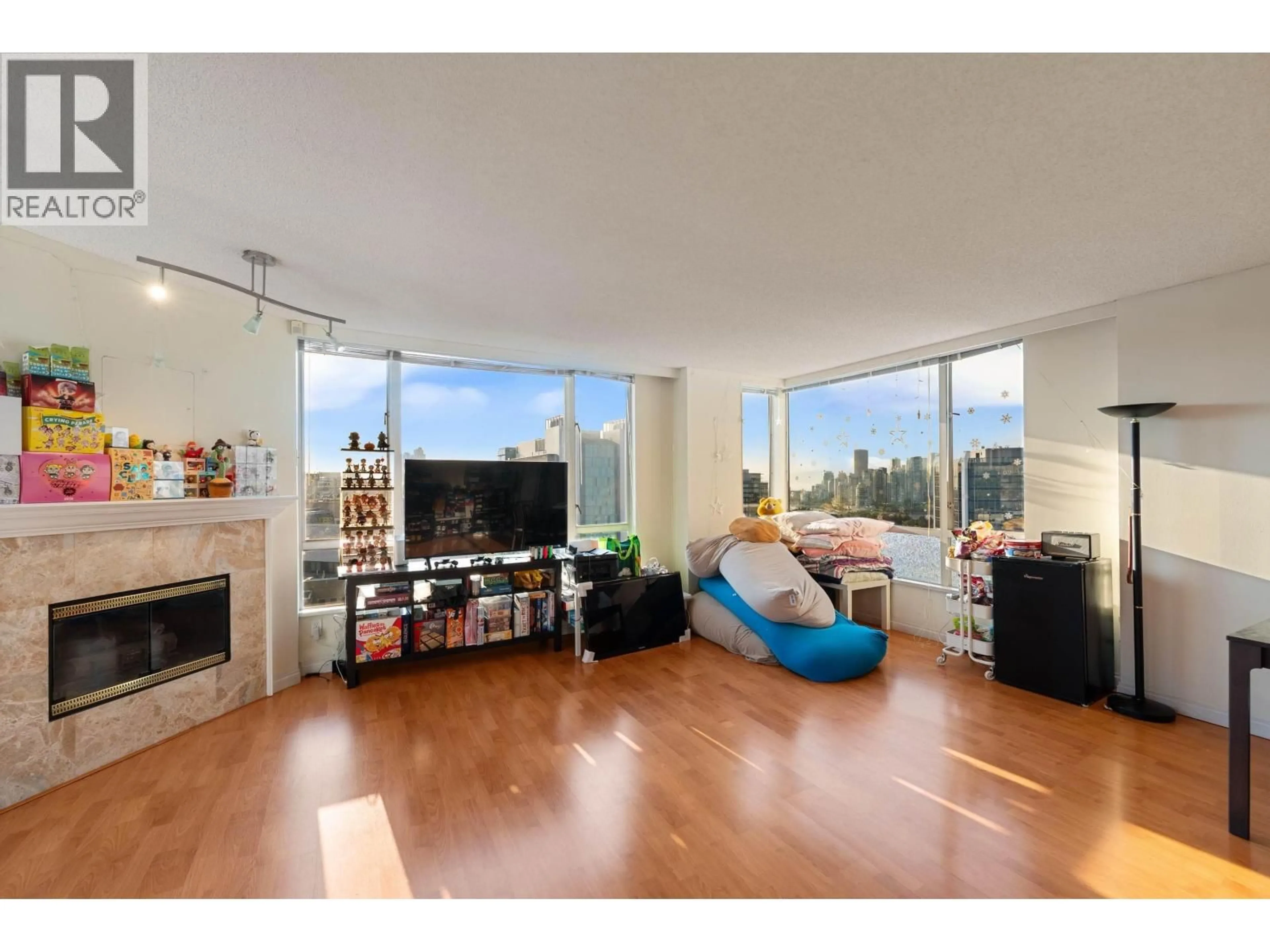 Living room with furniture, wood/laminate floor for 1301 - 2628 ASH STREET, Vancouver British Columbia V5Z4L2