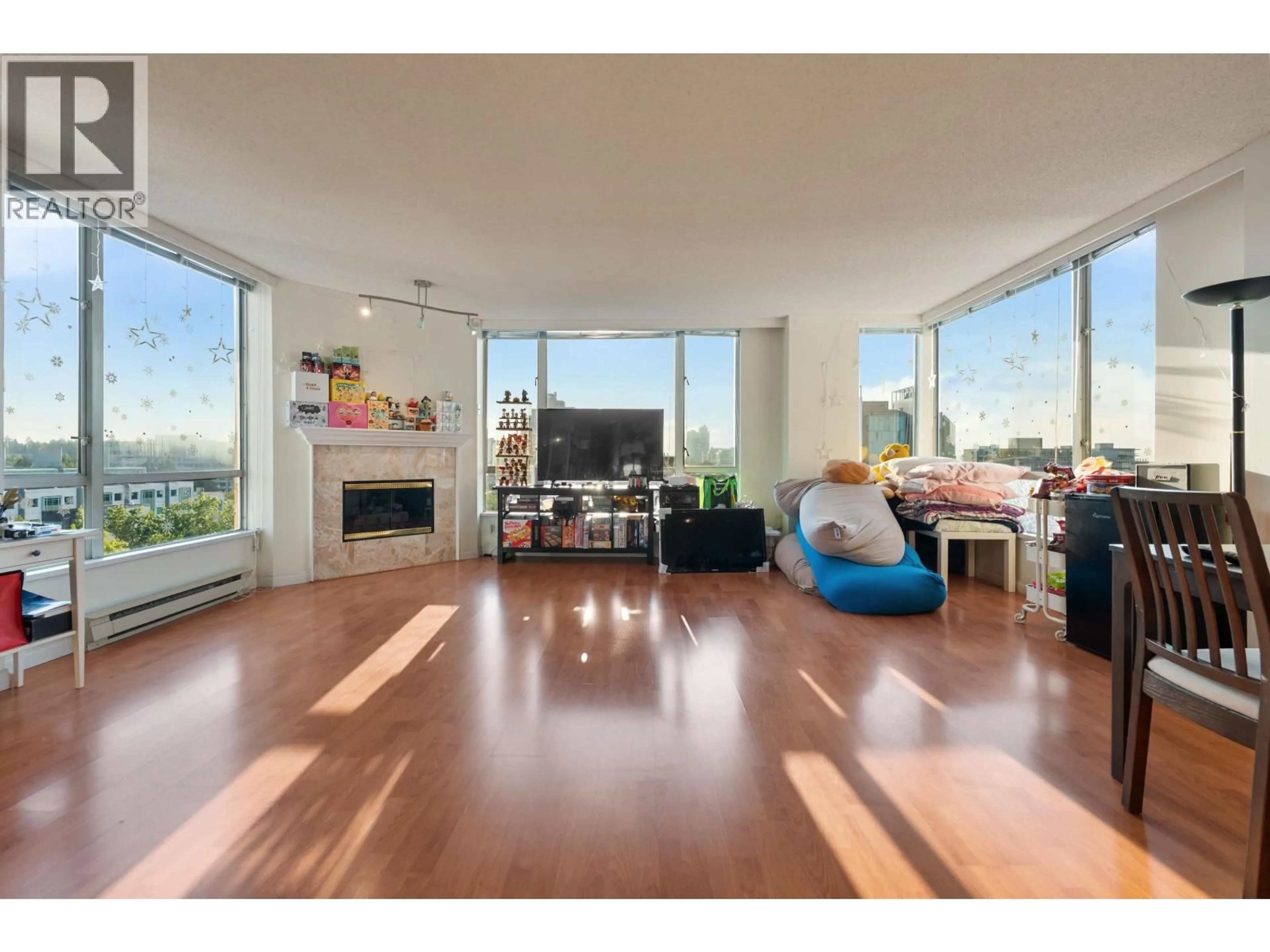 Living room with furniture, wood/laminate floor for 1301 - 2628 ASH STREET, Vancouver British Columbia V5Z4L2