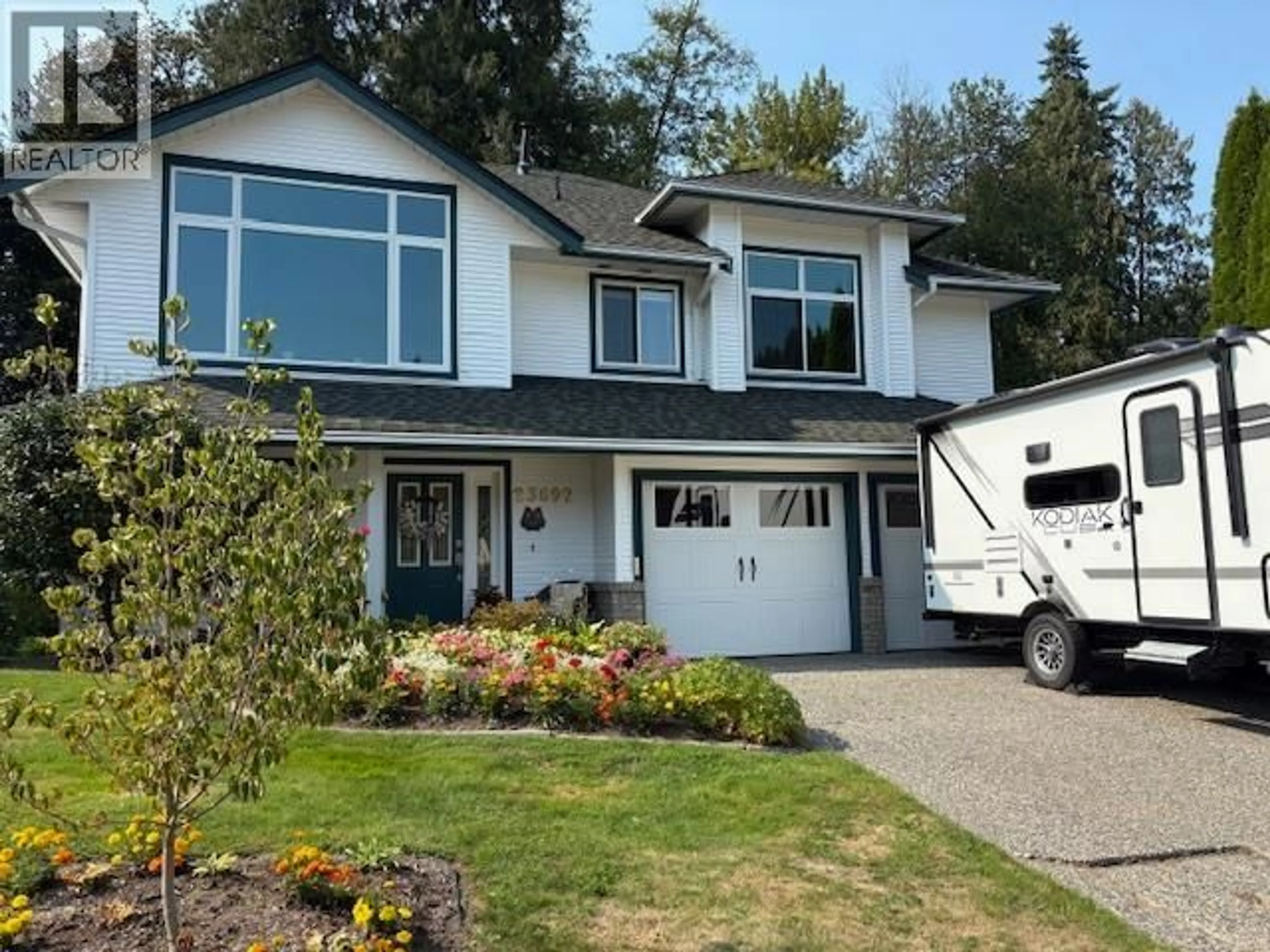 Home with vinyl exterior material, street for 23692 108 LOOP, Maple Ridge British Columbia V2W1B2