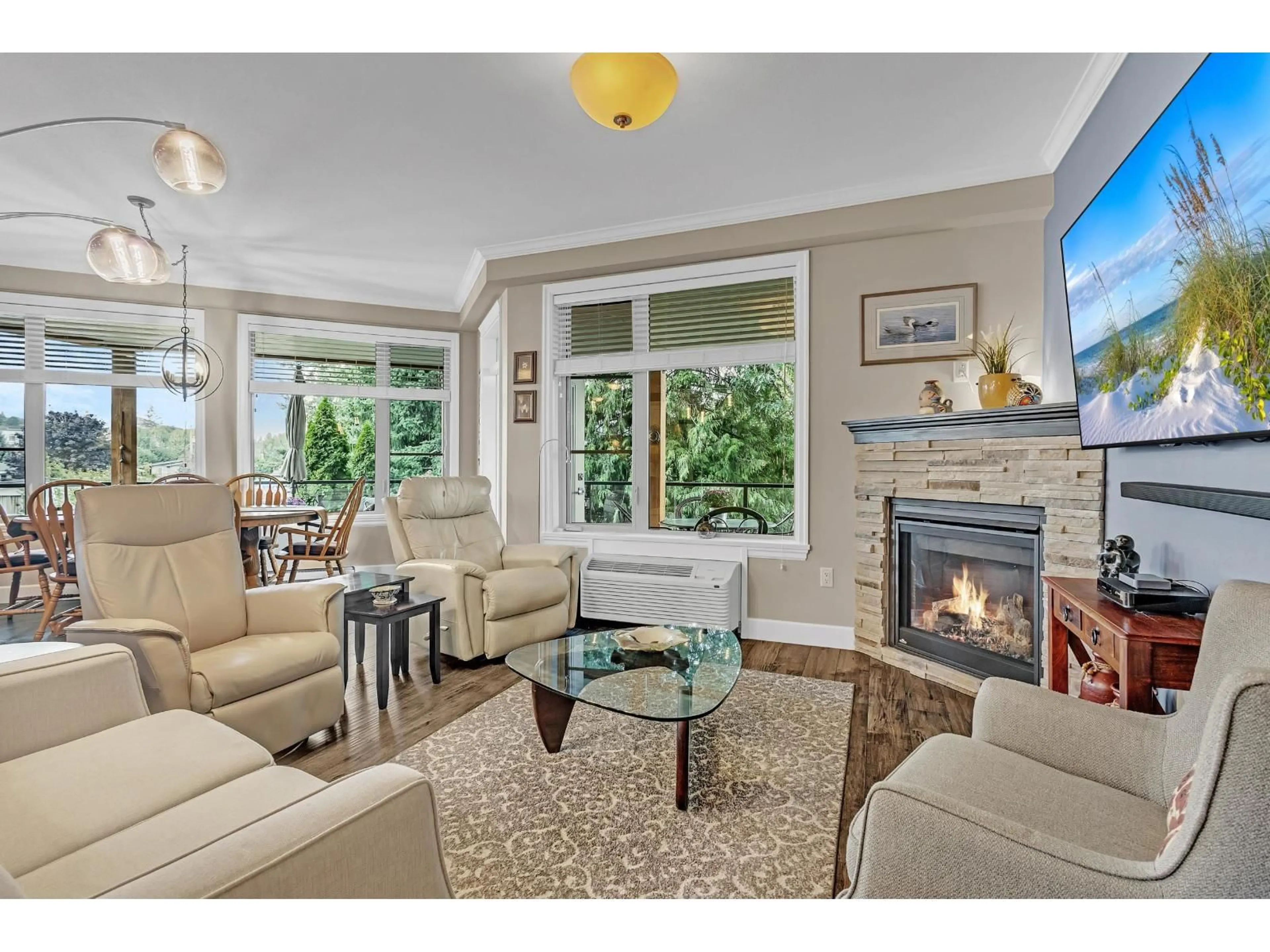 Living room with furniture, ceramic/tile floor for 304 - 45754 KEITH WILSON ROAD, Chilliwack British Columbia V2R6A2