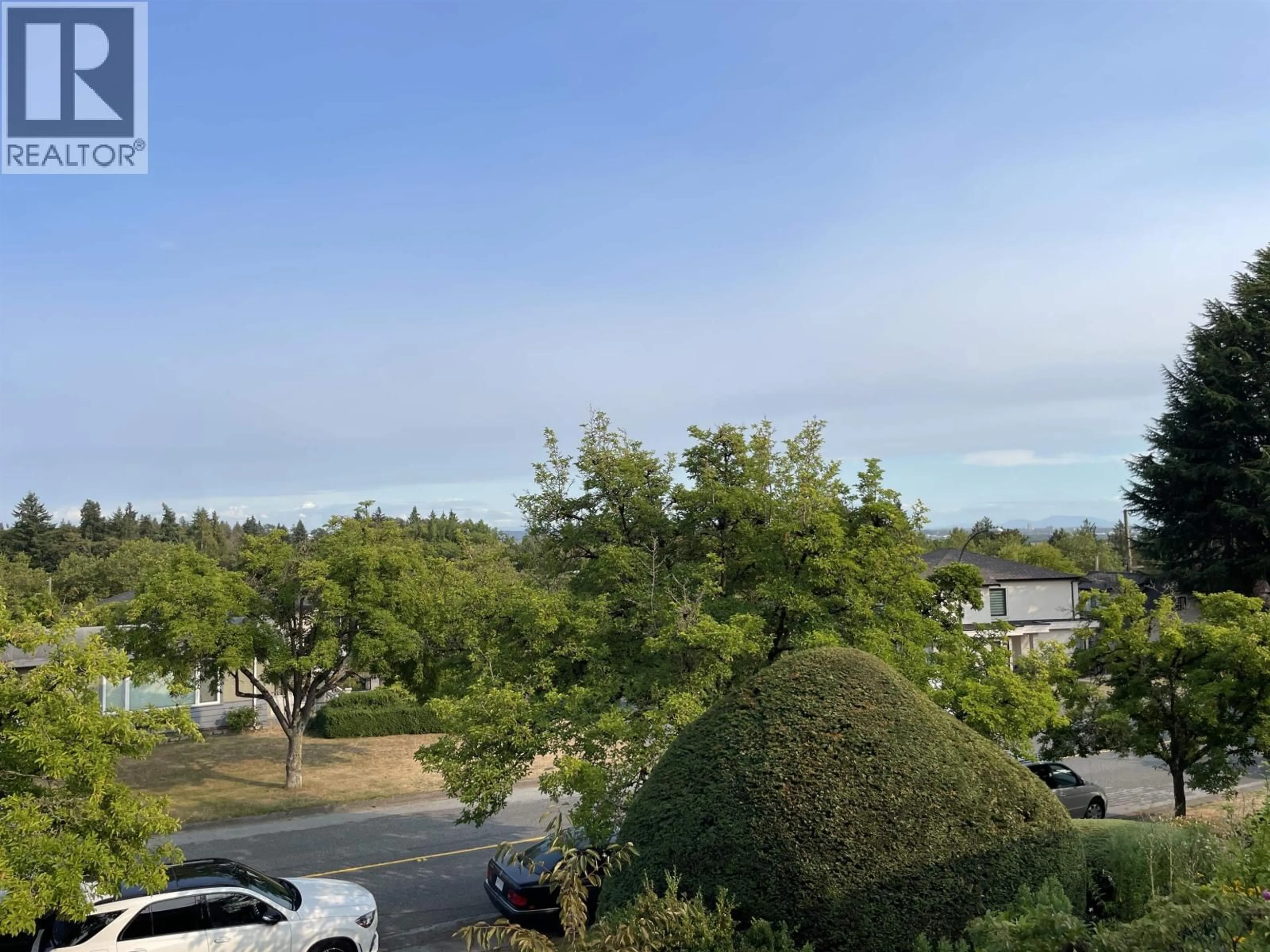 A pic from outside/outdoor area/front of a property/back of a property/a pic from drone, unknown for 7621 ELLIOTT STREET, Vancouver British Columbia V5S2N8