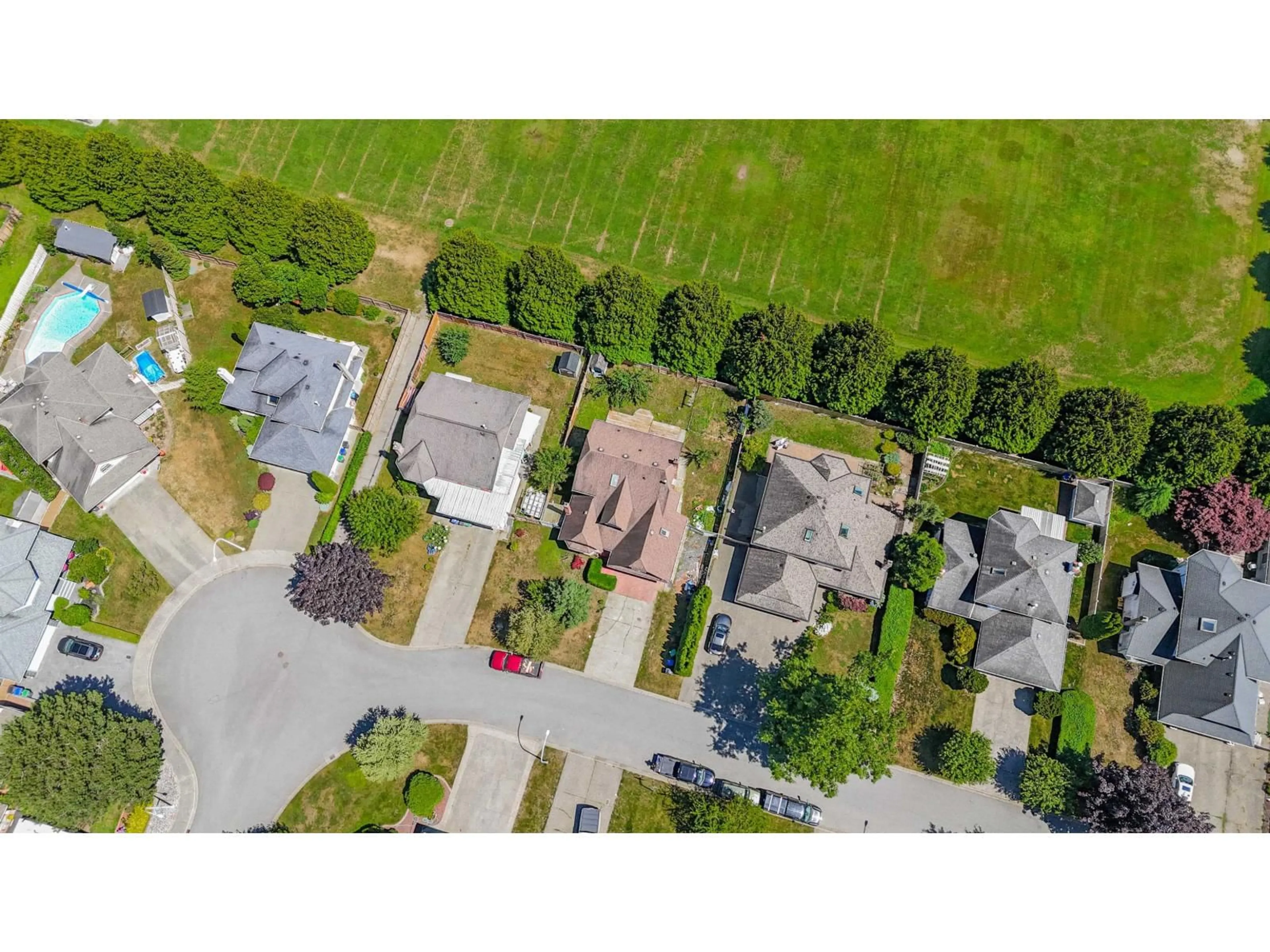 A pic from outside/outdoor area/front of a property/back of a property/a pic from drone, street for 9692 157B, Surrey British Columbia V4N2T3