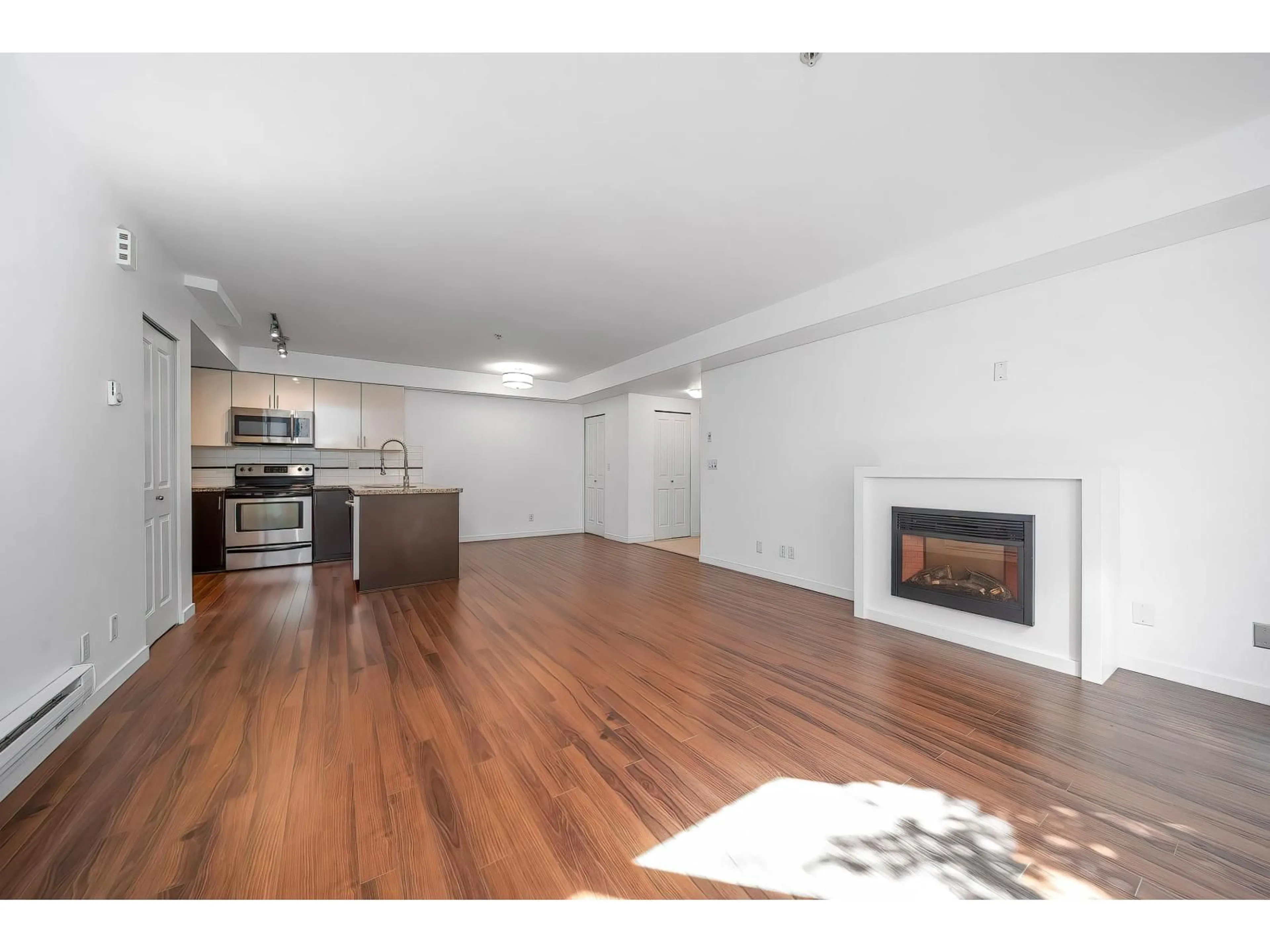 Open concept kitchen, wood/laminate floor for 58 - 13239 OLD YALE, Surrey British Columbia V3T3C5
