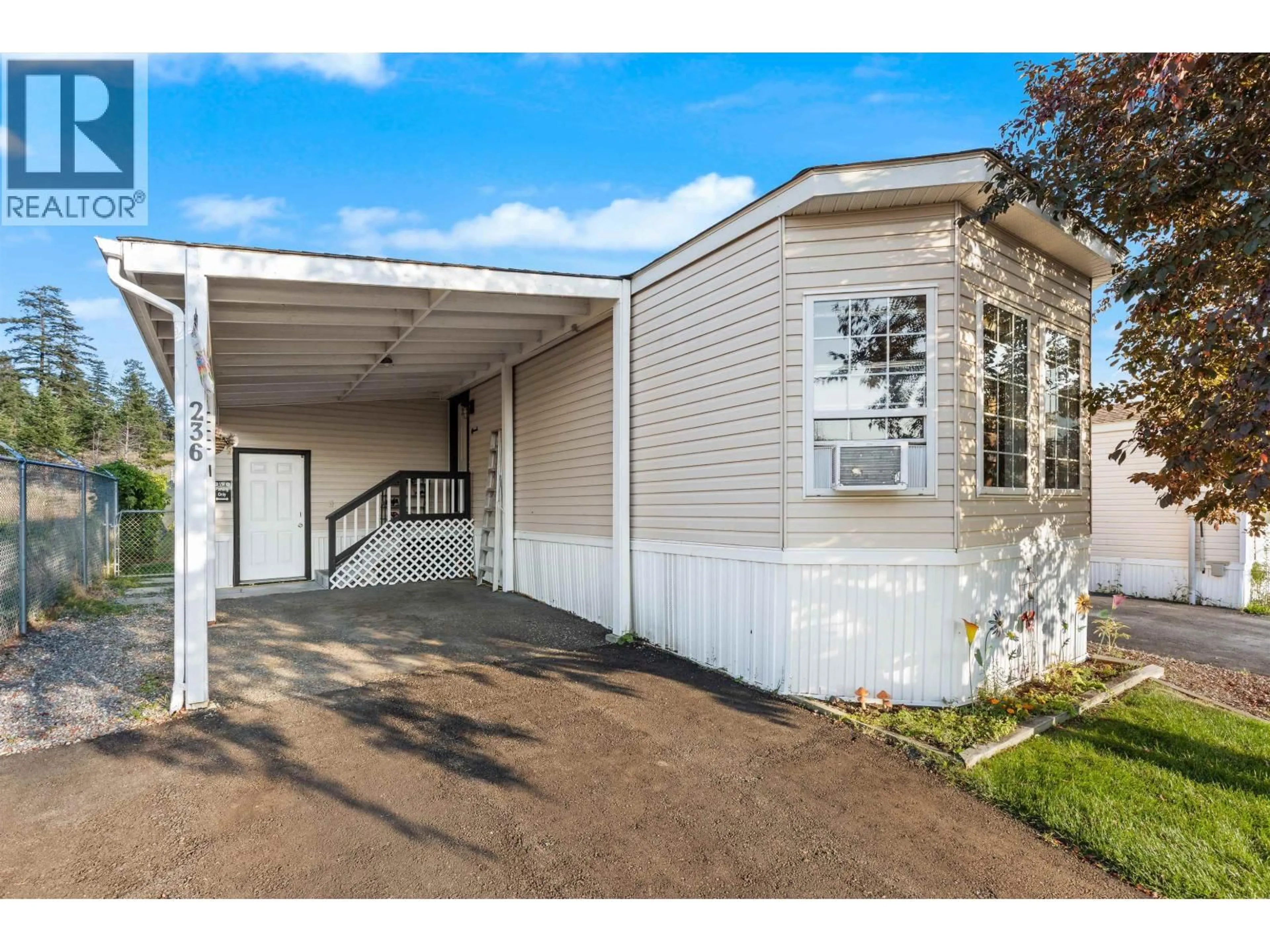 Home with vinyl exterior material, street for 236 LONGHORN DRIVE, Williams Lake British Columbia V2G4T7