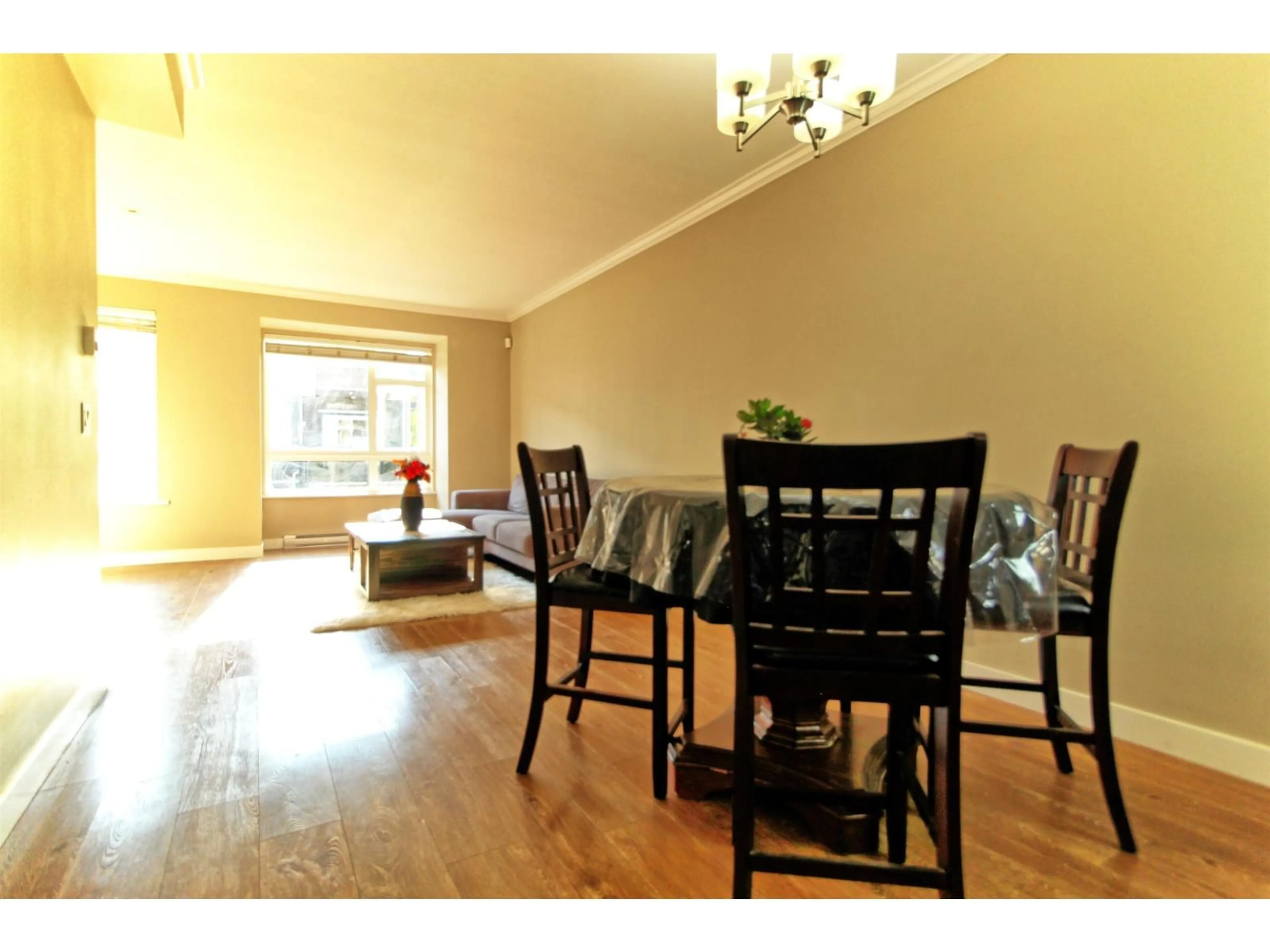 Dining room, wood/laminate floor for 26 - 5888 144, Surrey British Columbia V3X0G8