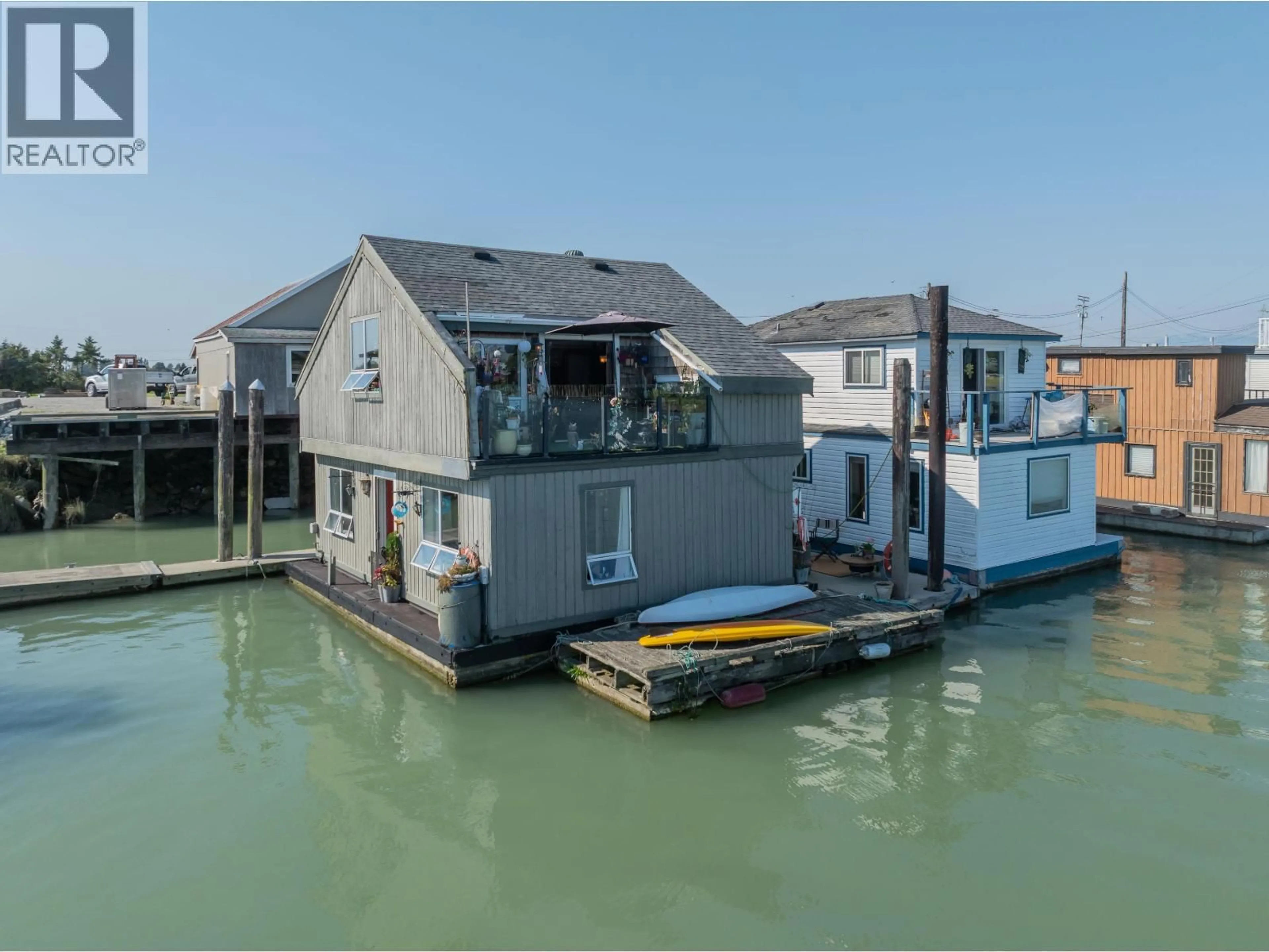 A pic from outside/outdoor area/front of a property/back of a property/a pic from drone, water/lake/river/ocean view for 12 - 3550 WESTHAM ISLAND ROAD, Delta British Columbia V4K0A4