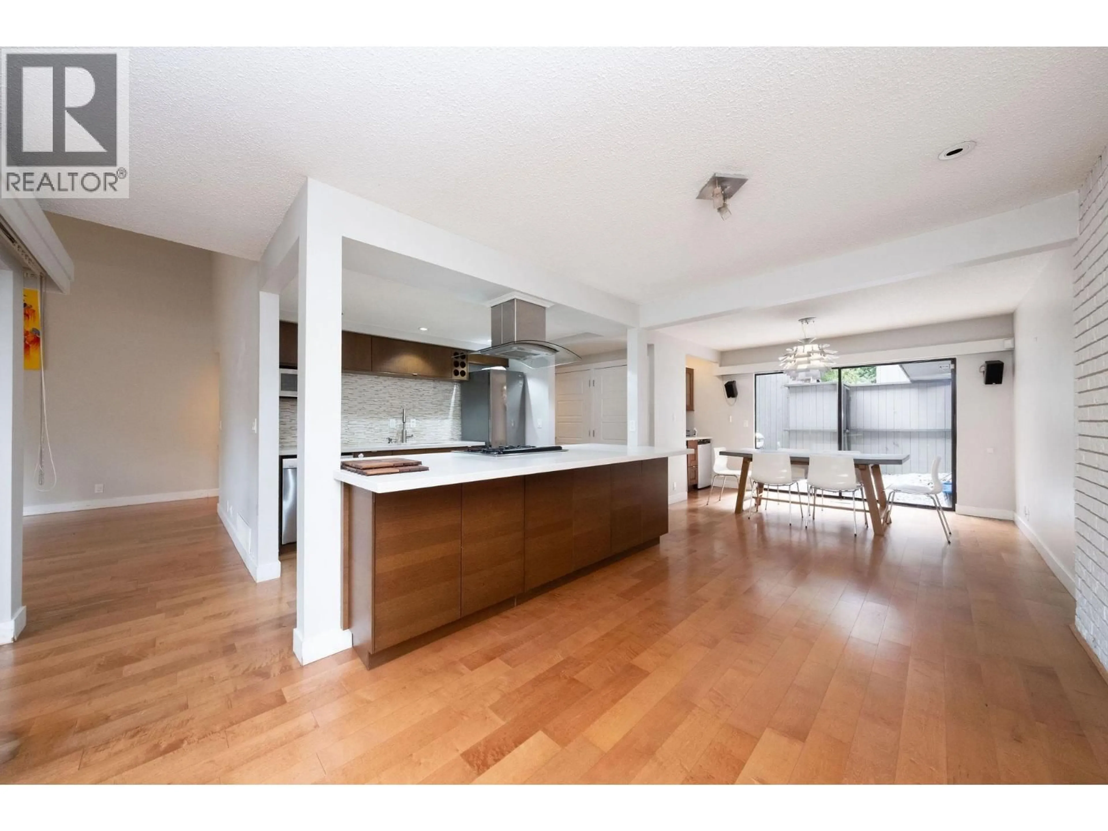 Open concept kitchen, wood/laminate floor for 2889 CAPILANO ROAD, North Vancouver British Columbia V7R4H4