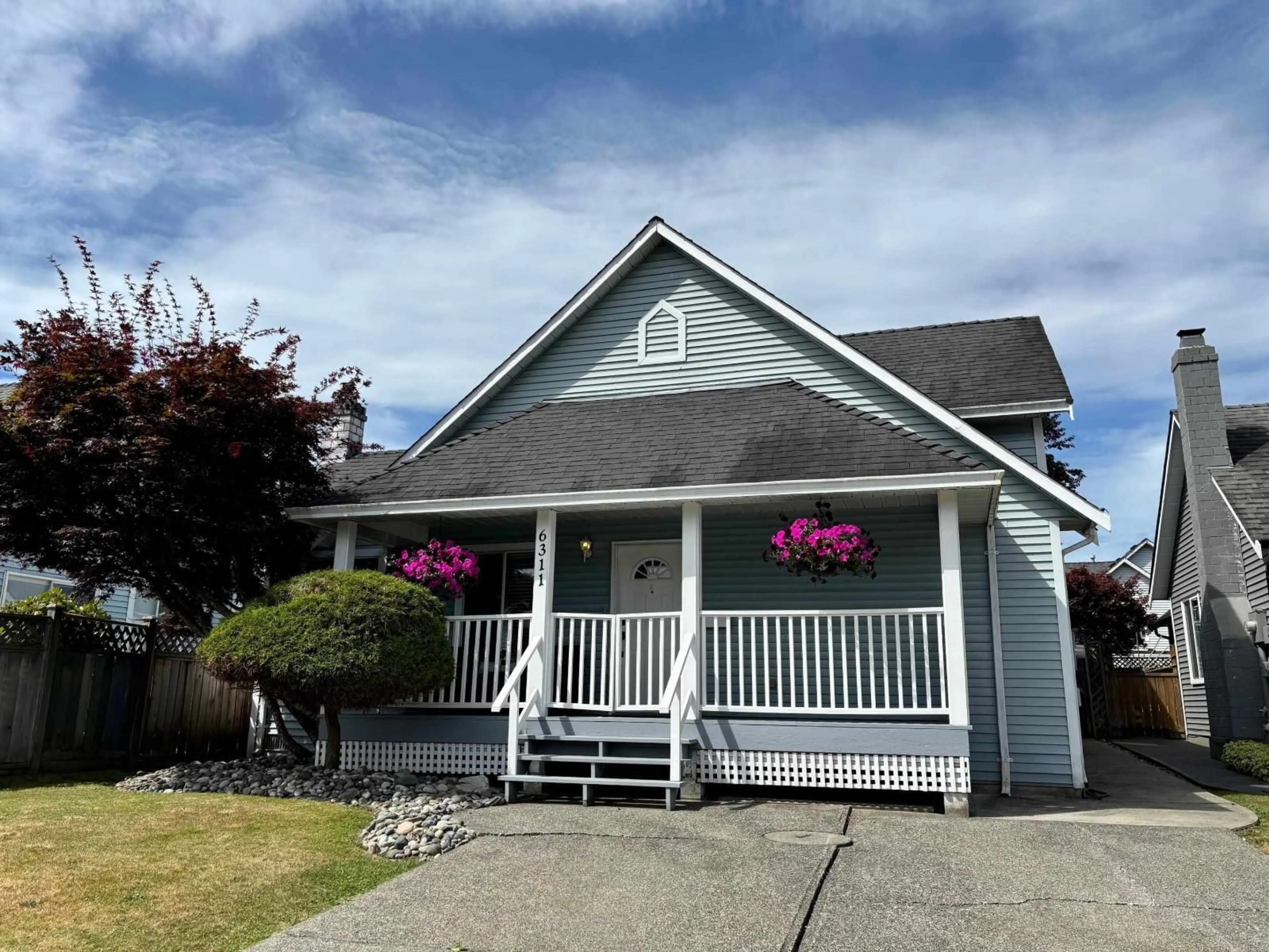 Home with vinyl exterior material, street for 6311 135A, Surrey British Columbia V3X1J7