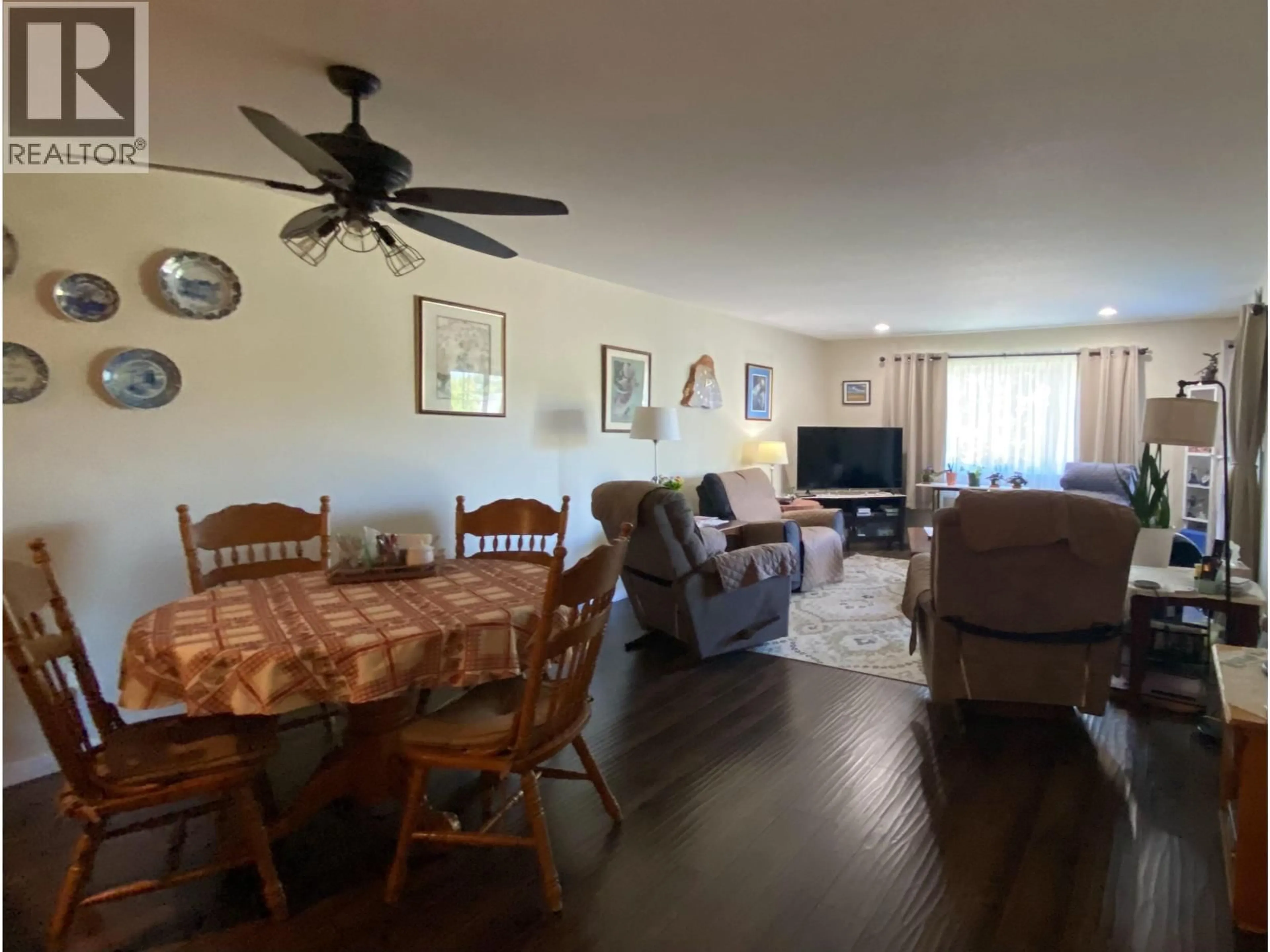 Living room with furniture, wood/laminate floor for 206 - 4719 DAVIS AVENUE, Terrace British Columbia V8G1Y1