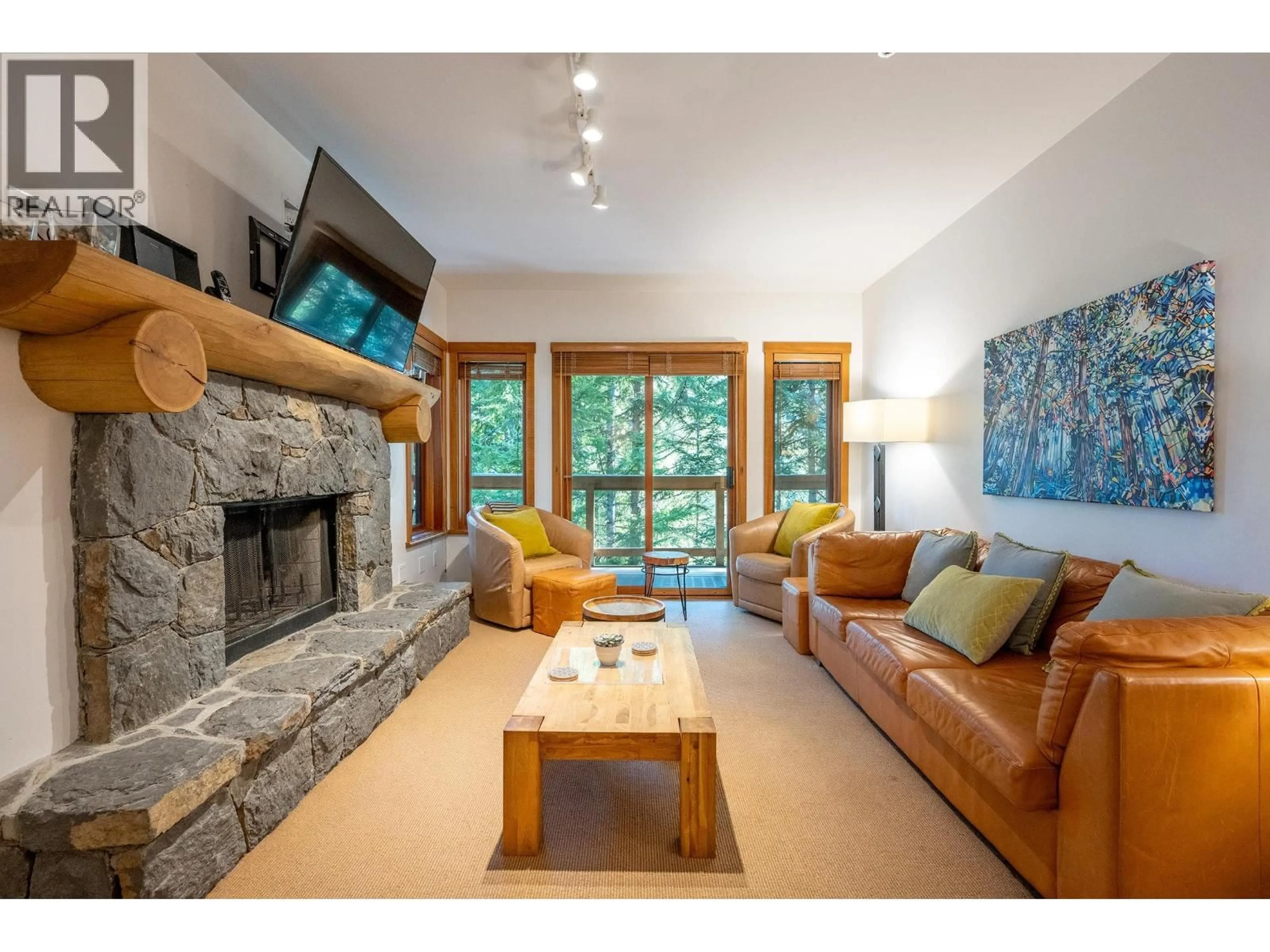Living room with furniture, wood/laminate floor for 6 - 2250 NORDIC DRIVE, Whistler British Columbia V8E0P4