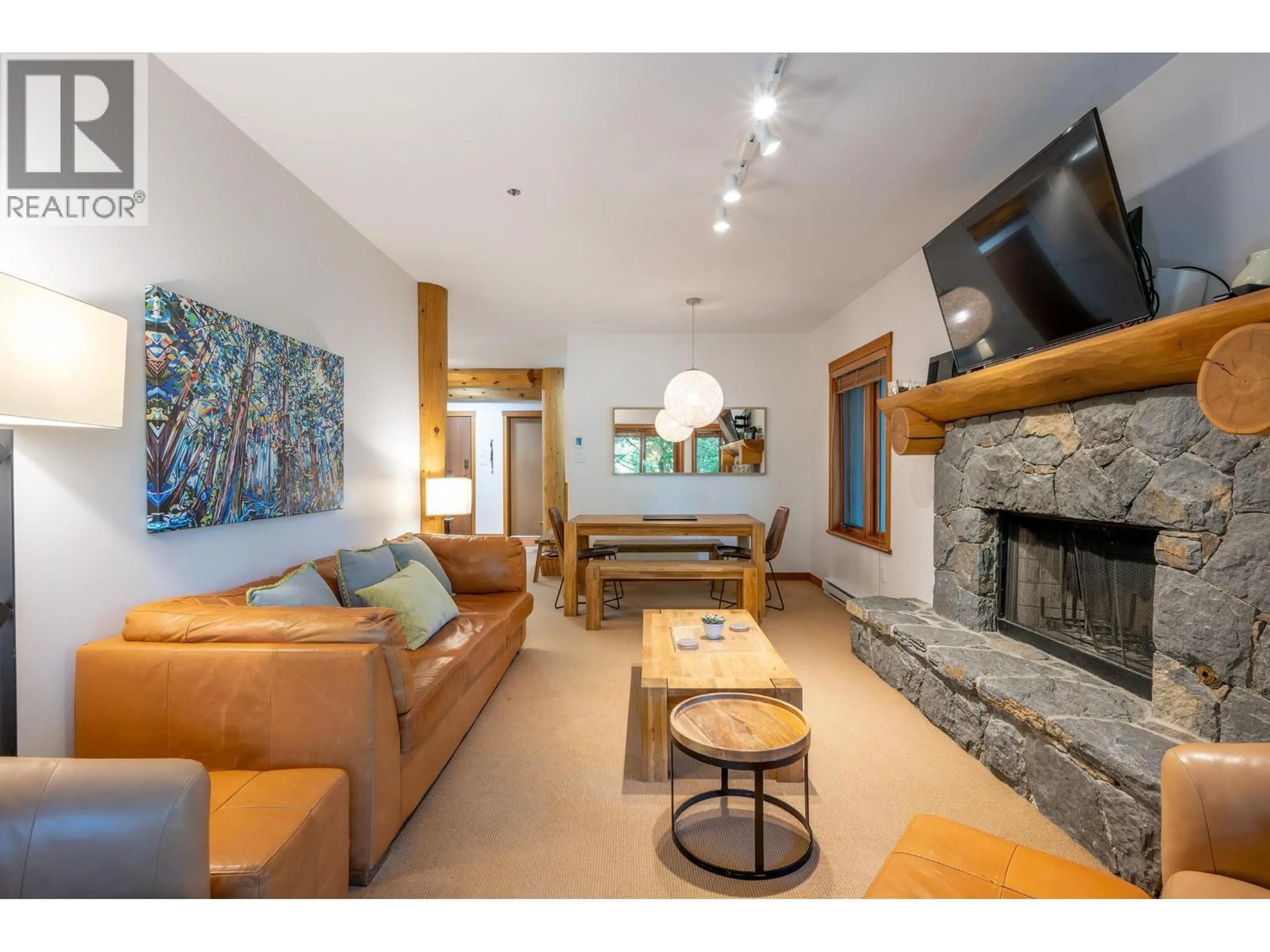 Living room with furniture, wood/laminate floor for 6 - 2250 NORDIC DRIVE, Whistler British Columbia V8E0P4
