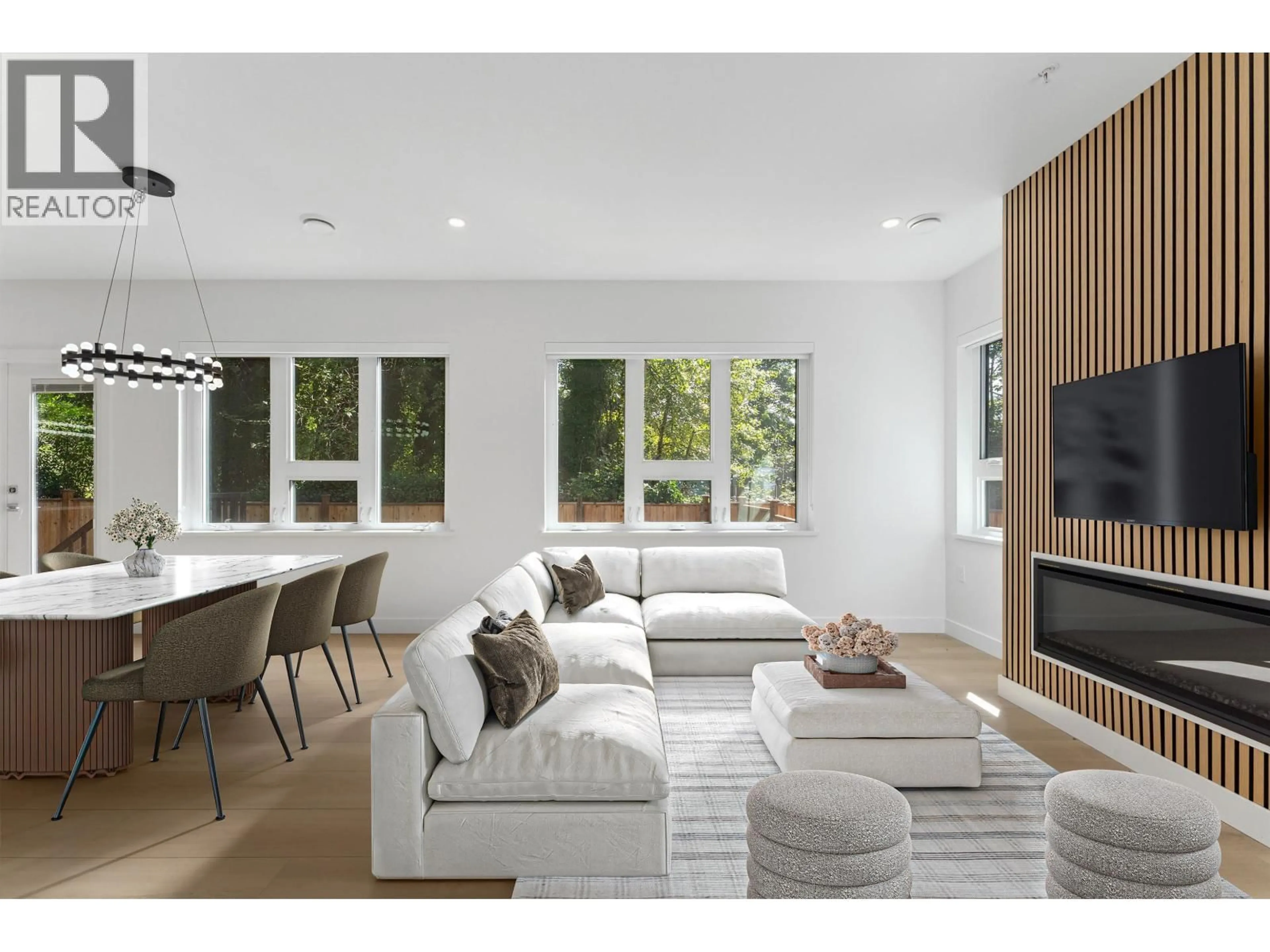 Living room with furniture, wood/laminate floor for 842 ST. DENIS AVENUE, North Vancouver British Columbia V7J2G4