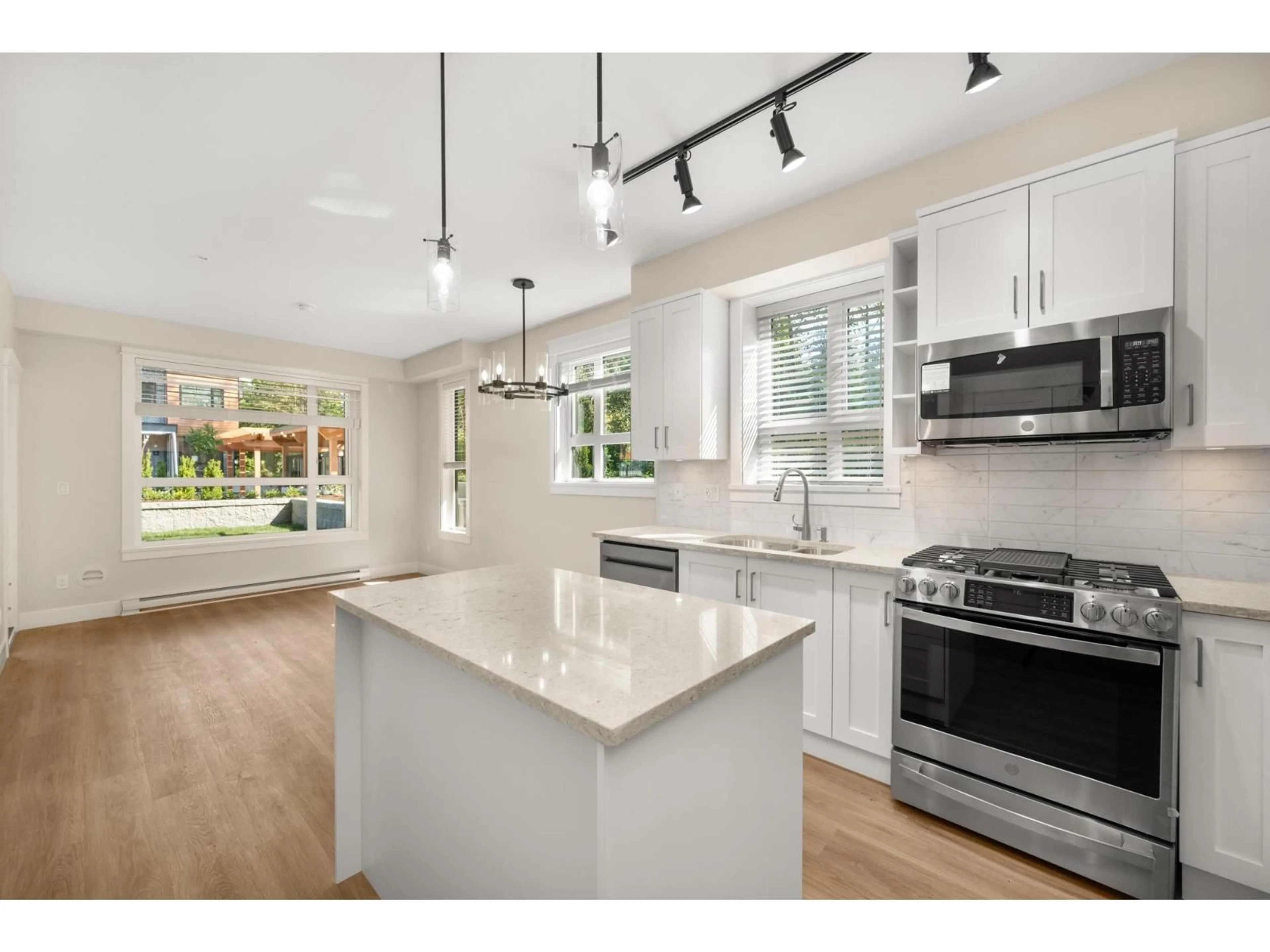 Open concept kitchen, unknown for 108 - 20926 83, Langley British Columbia V2Y3Y9