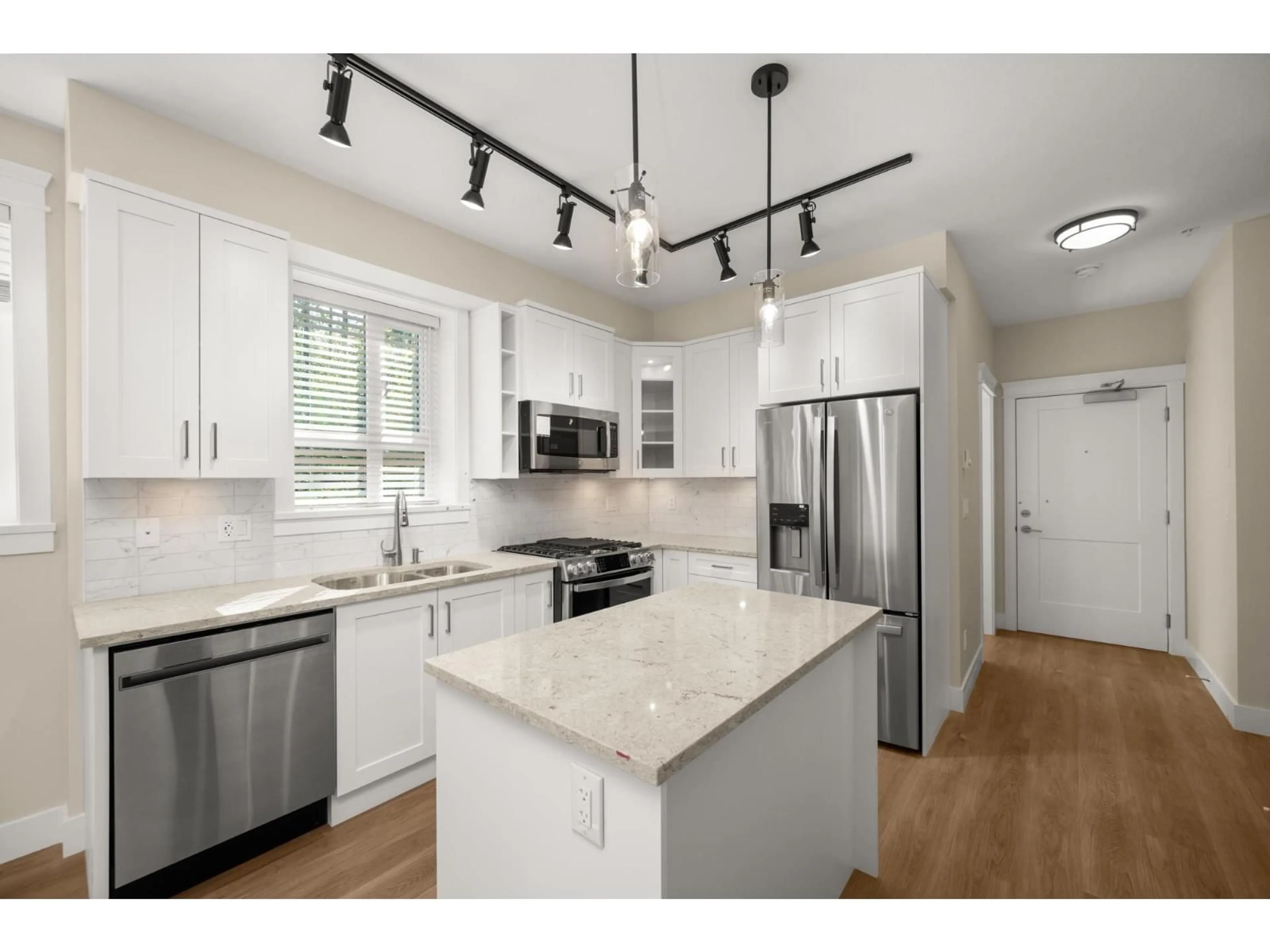Open concept kitchen, unknown for 108 - 20926 83, Langley British Columbia V2Y3Y9