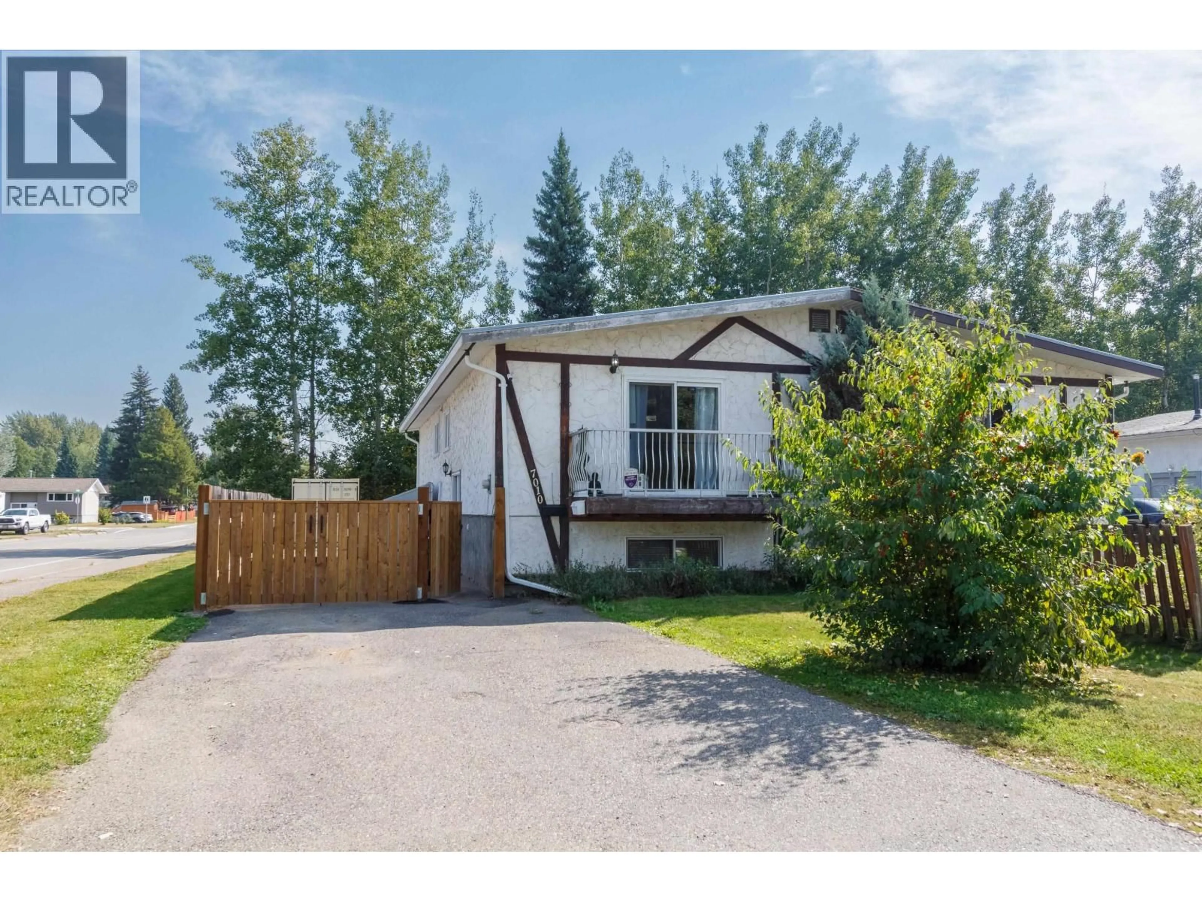 Home with vinyl exterior material, street for 7010 GUELPH CRESCENT, Prince George British Columbia V2N3P1
