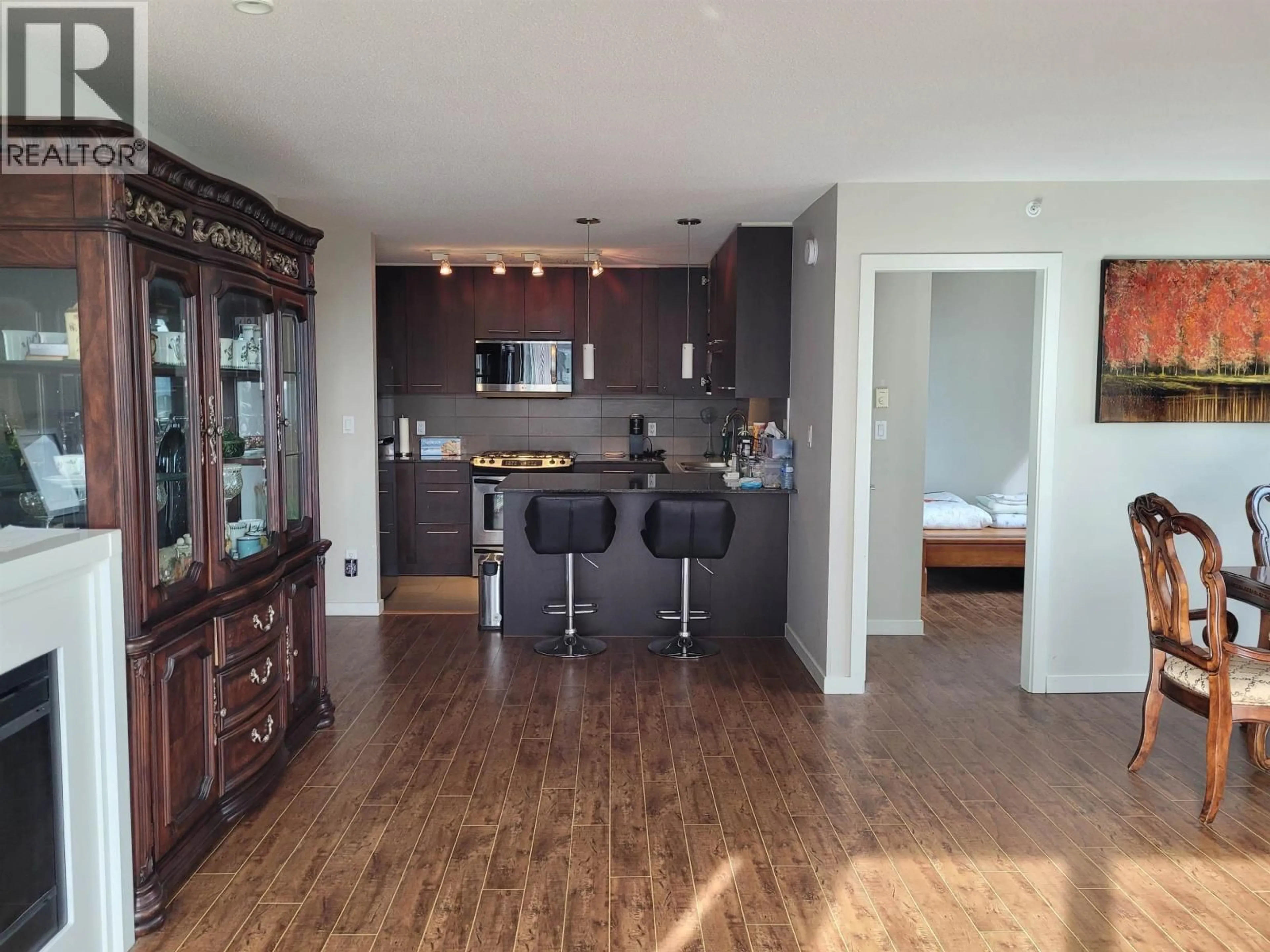 Open concept kitchen, wood/laminate floor for 1703 - 2979 GLEN DRIVE, Coquitlam British Columbia V3B0B2