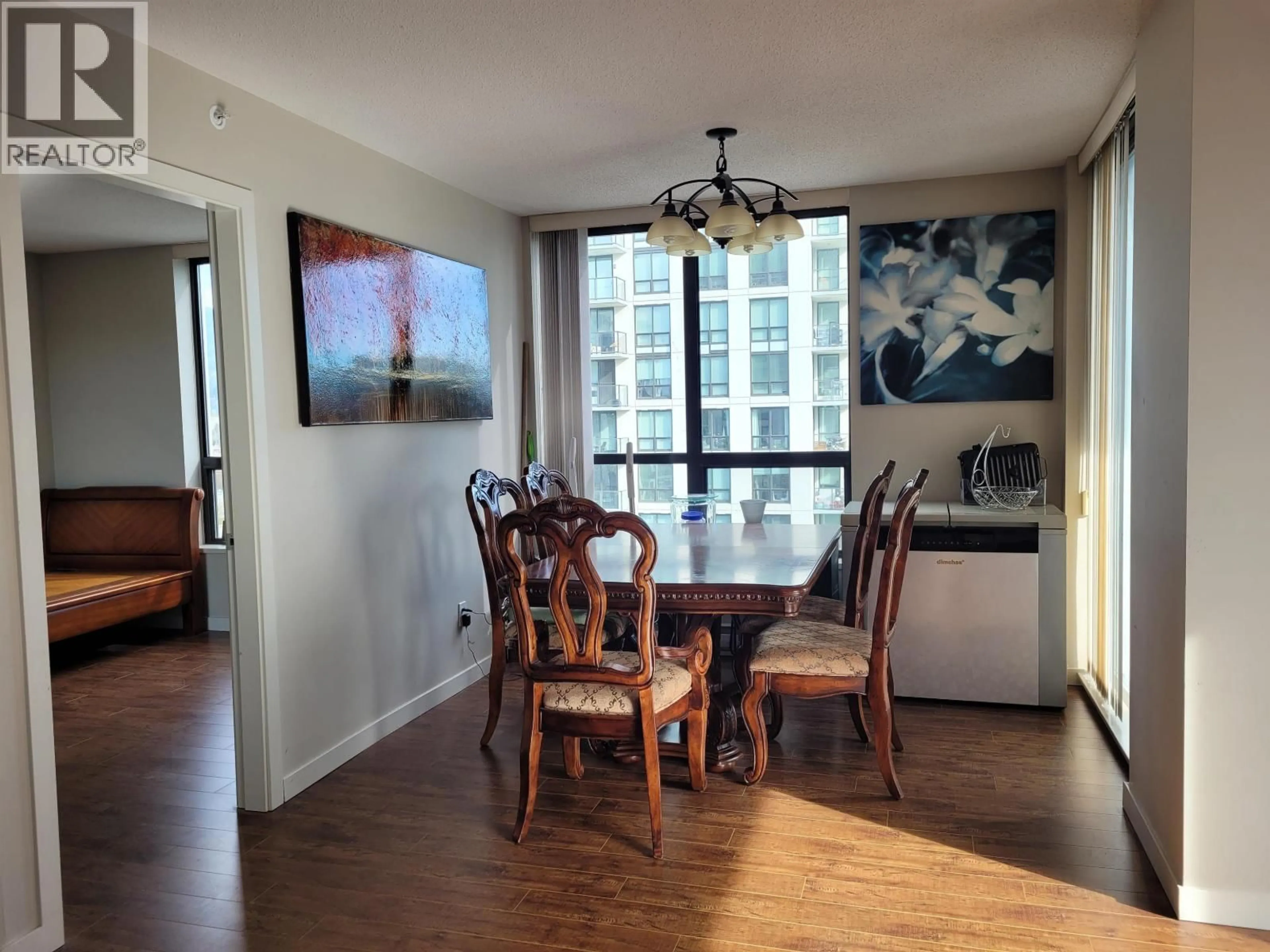 Dining room, wood/laminate floor for 1703 - 2979 GLEN DRIVE, Coquitlam British Columbia V3B0B2